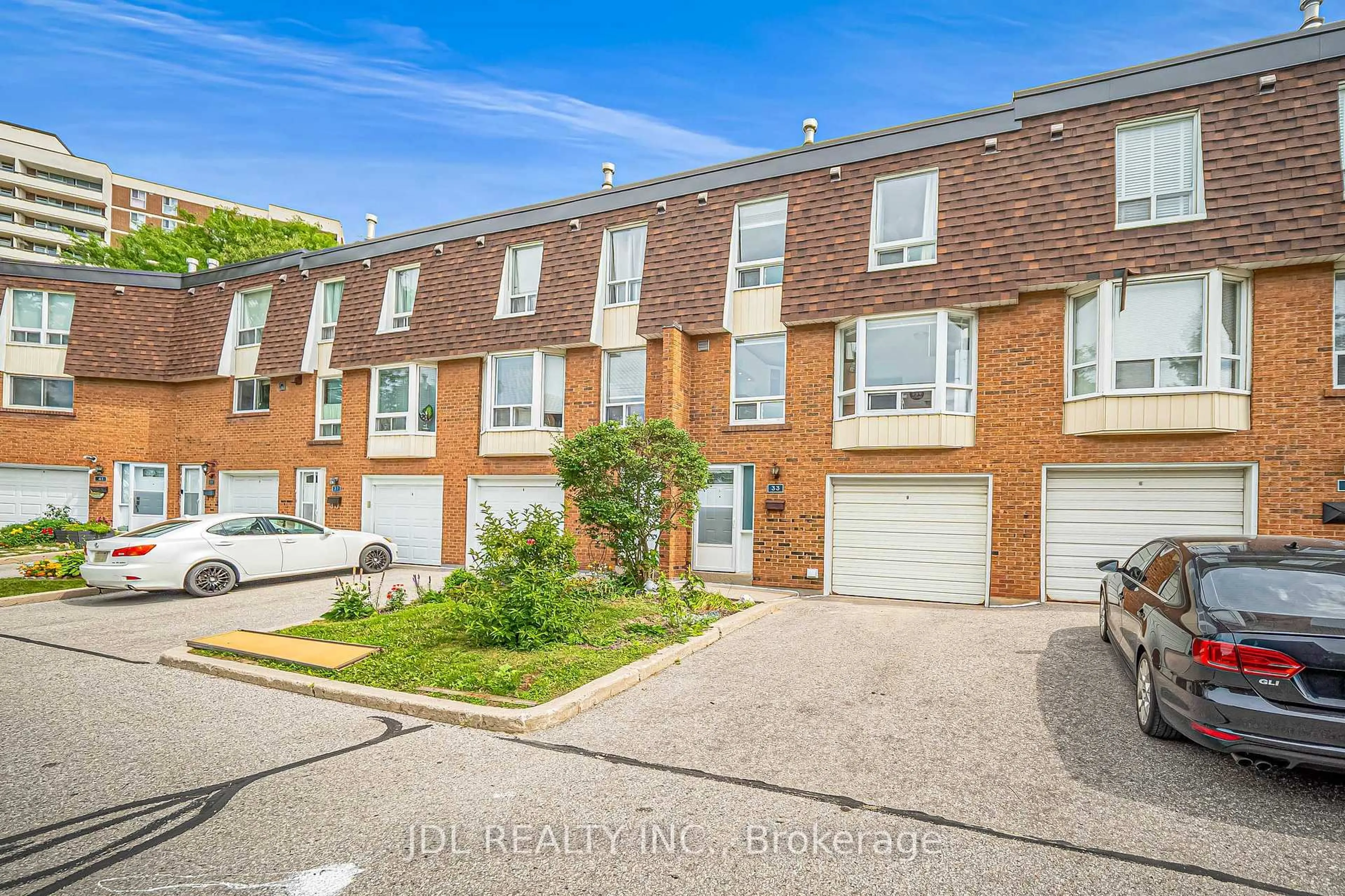 A pic from outside/outdoor area/front of a property/back of a property/a pic from drone, street for 100 Bridletowne Circ #33, Toronto Ontario M1W 2G8
