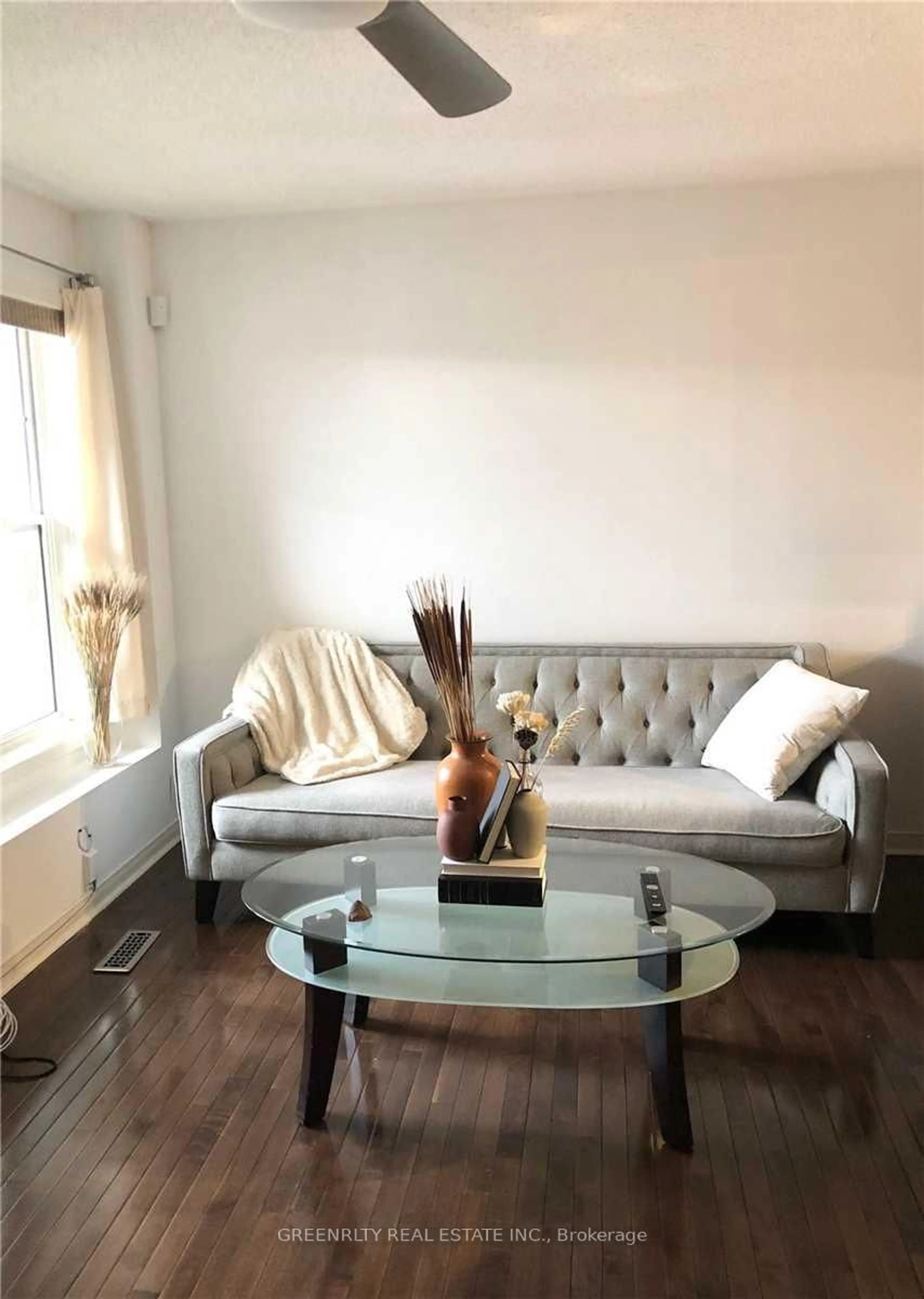 Living room with furniture, wood/laminate floor for 5539 Lawrence Ave, Toronto Ontario M1C 5K4