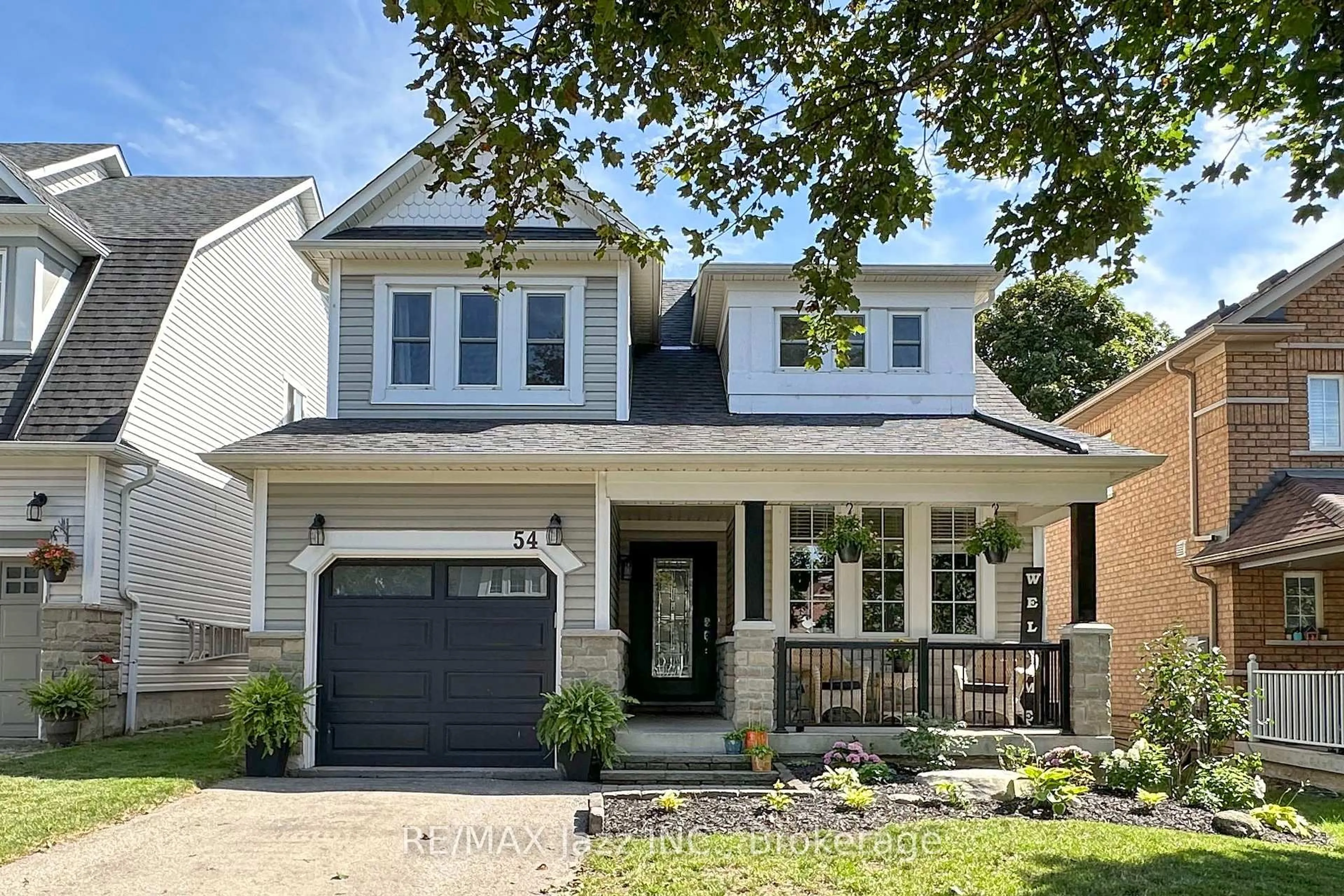 Home with brick exterior material, street for 54 Melody Dr, Whitby Ontario L1M 1K6