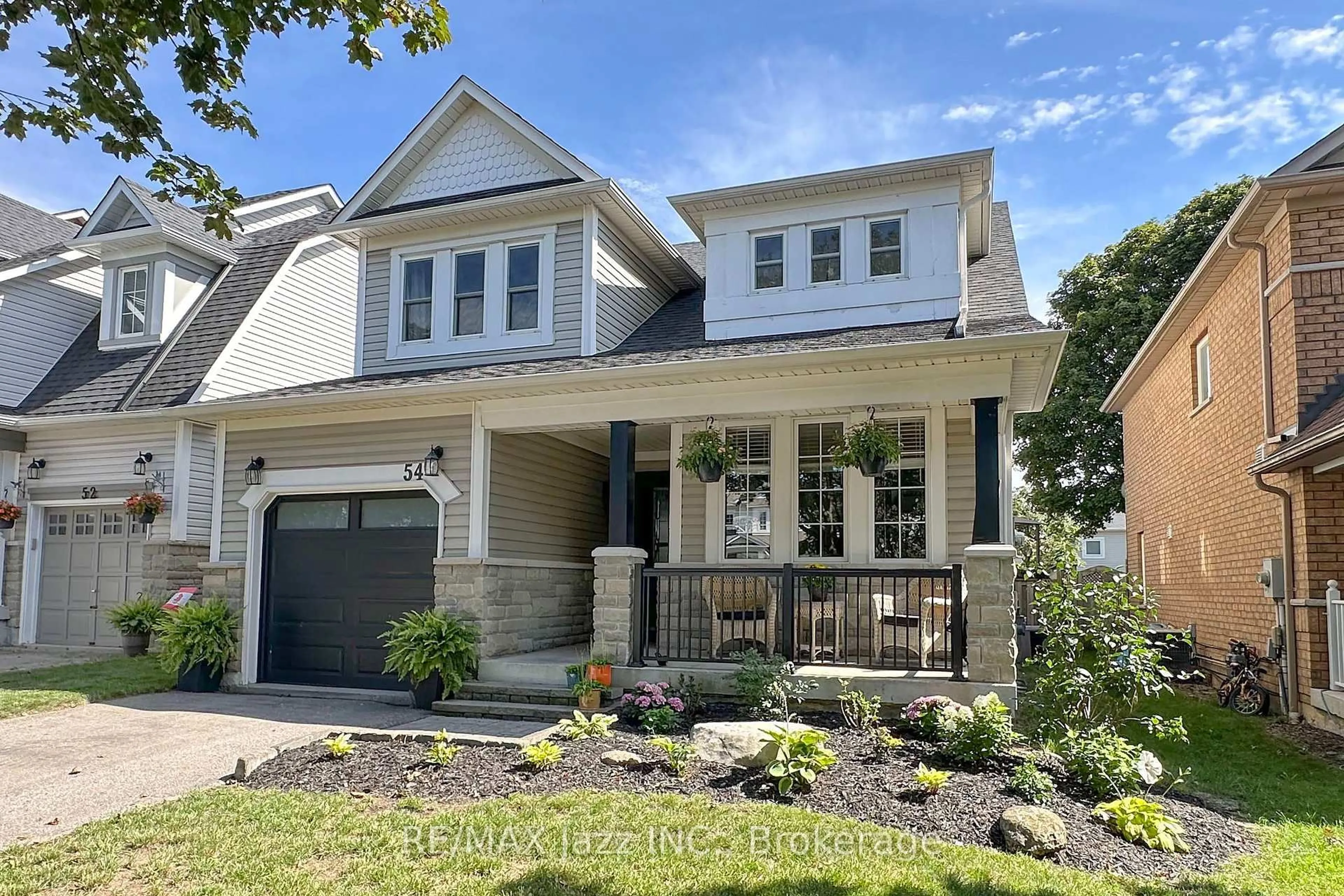 Home with brick exterior material, street for 54 Melody Dr, Whitby Ontario L1M 1K6