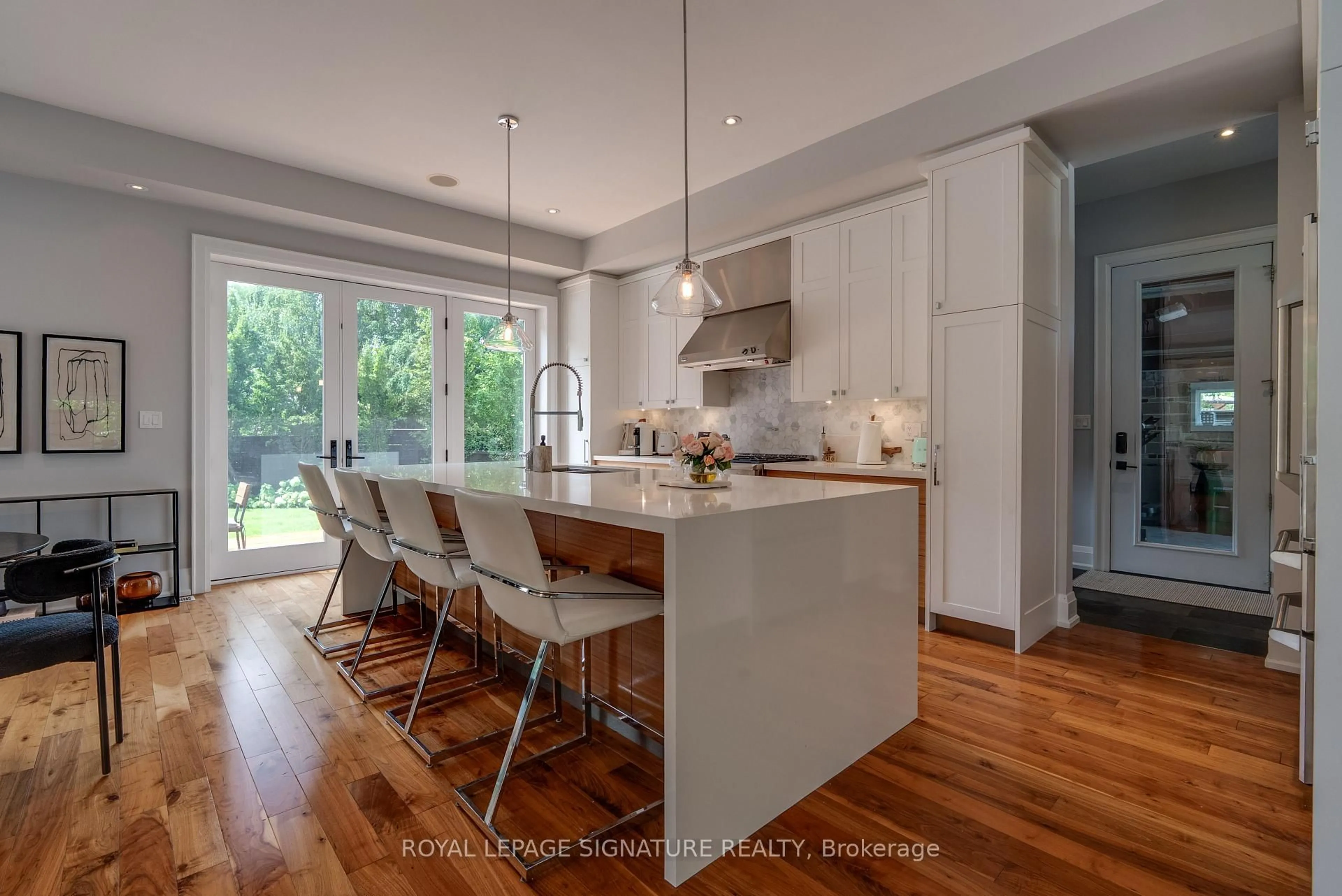 Open concept kitchen, wood/laminate floor for 12 Cudia Cres, Toronto Ontario M1M 2W8