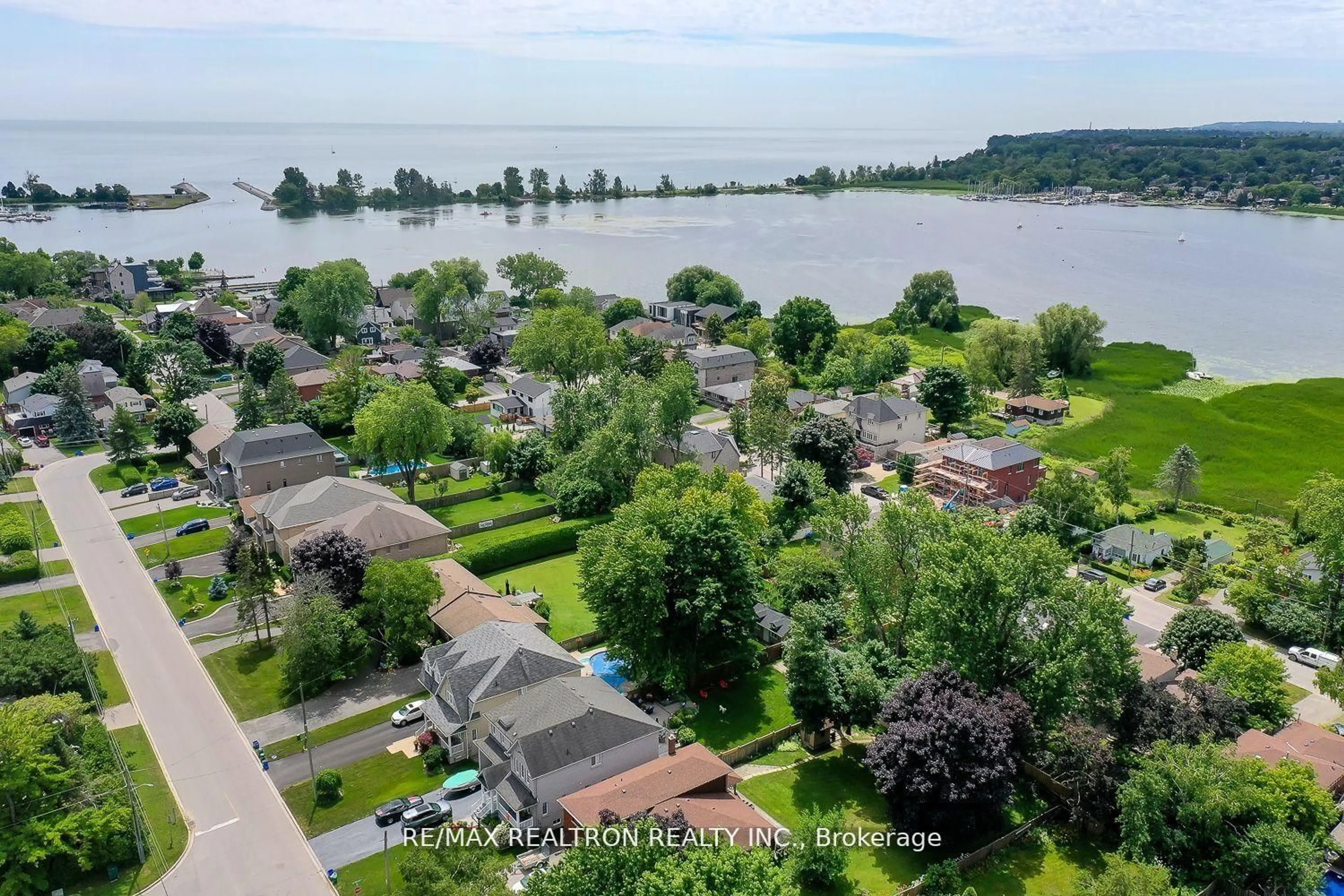 A pic from outside/outdoor area/front of a property/back of a property/a pic from drone, water/lake/river/ocean view for 809 Fairview Ave, Pickering Ontario L1W 1M7