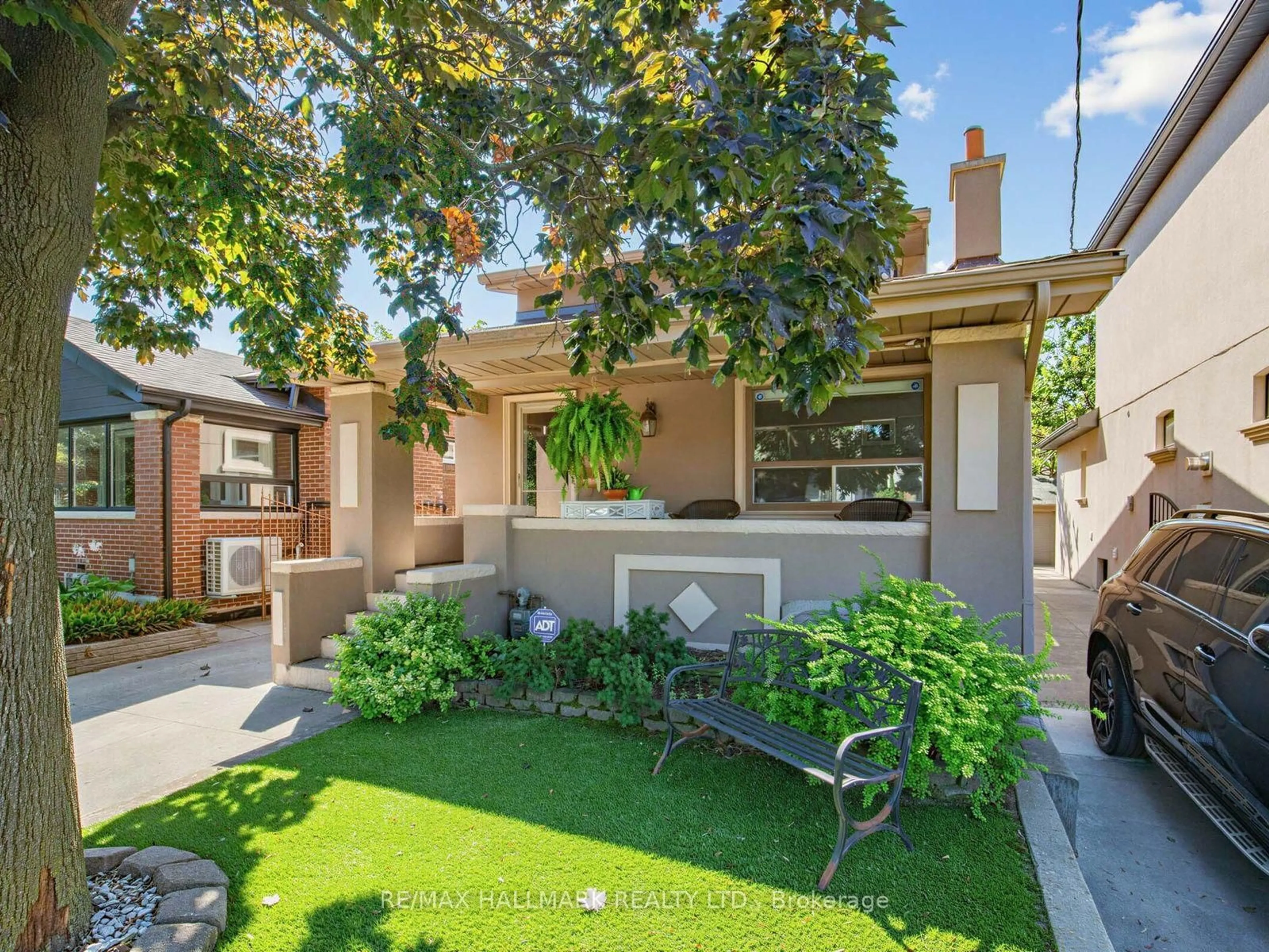 Home with brick exterior material, street for 297 Strathmore Blvd, Toronto Ontario M4J 1P9