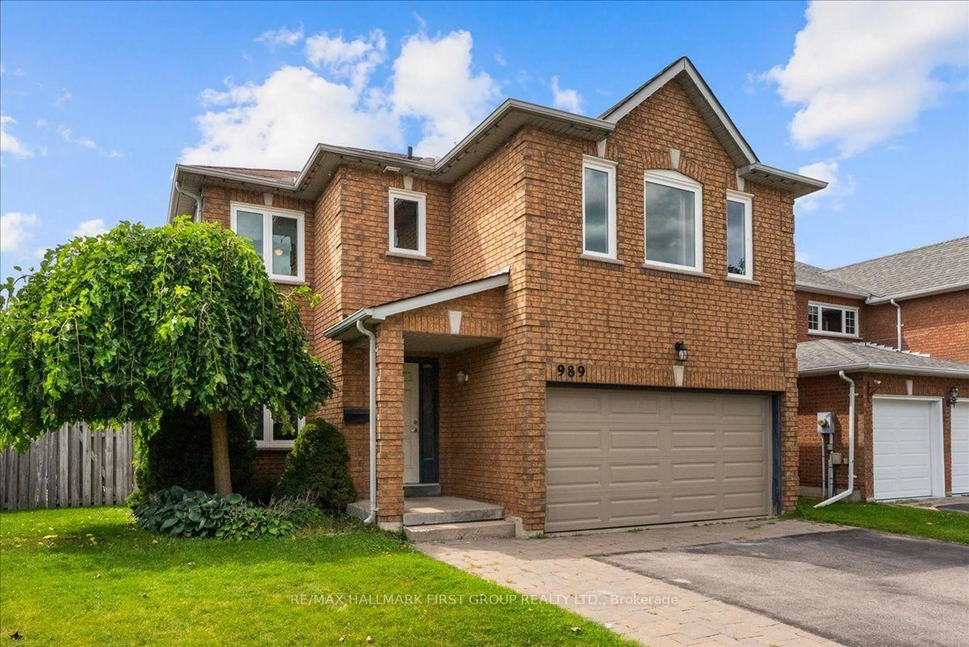 Home with brick exterior material, street for 989 Deer Valley Dr, Oshawa Ontario L1J 8N2