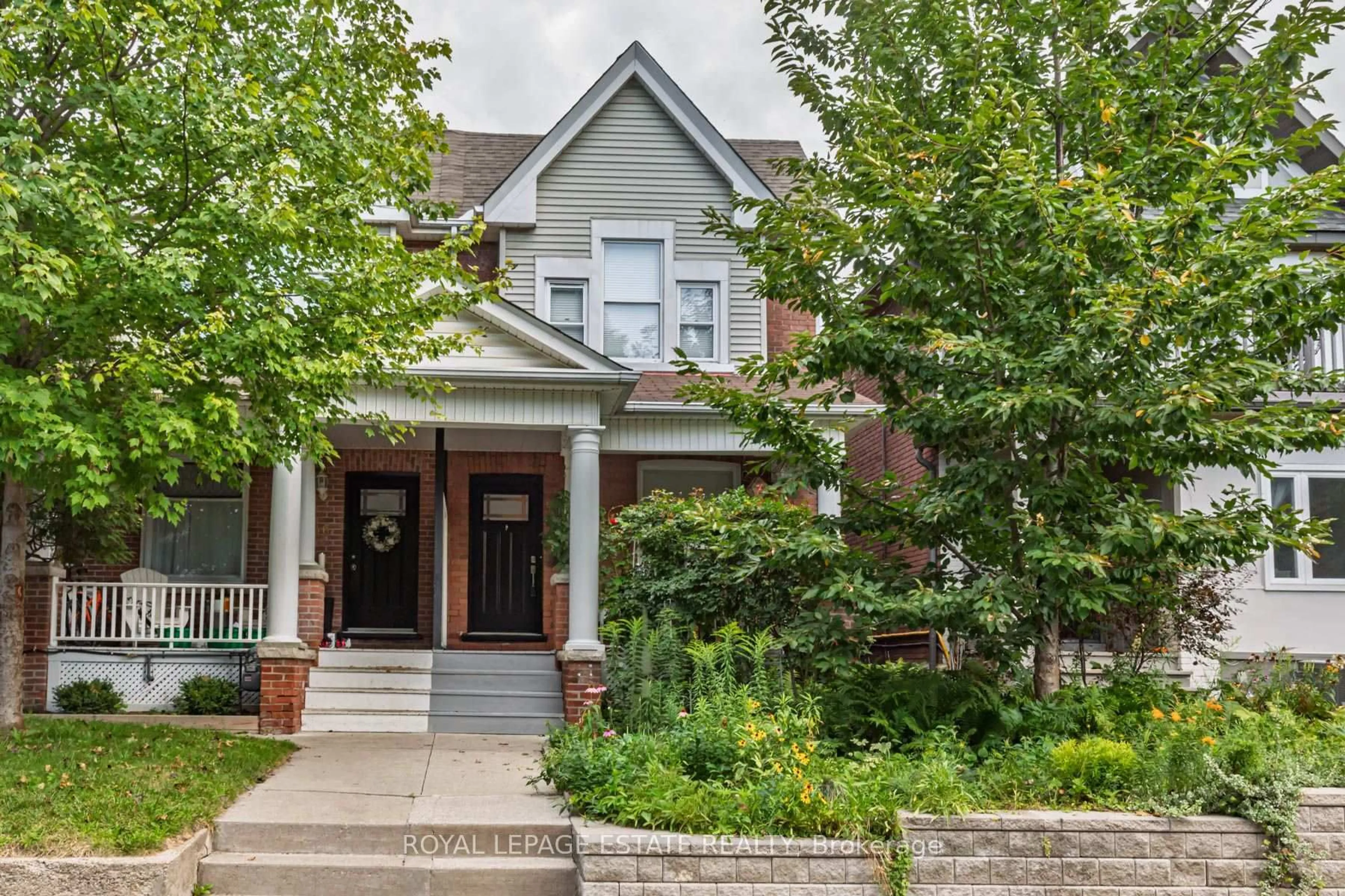 Home with brick exterior material, street for 48 Bloomfield Ave, Toronto Ontario M4L 2G3
