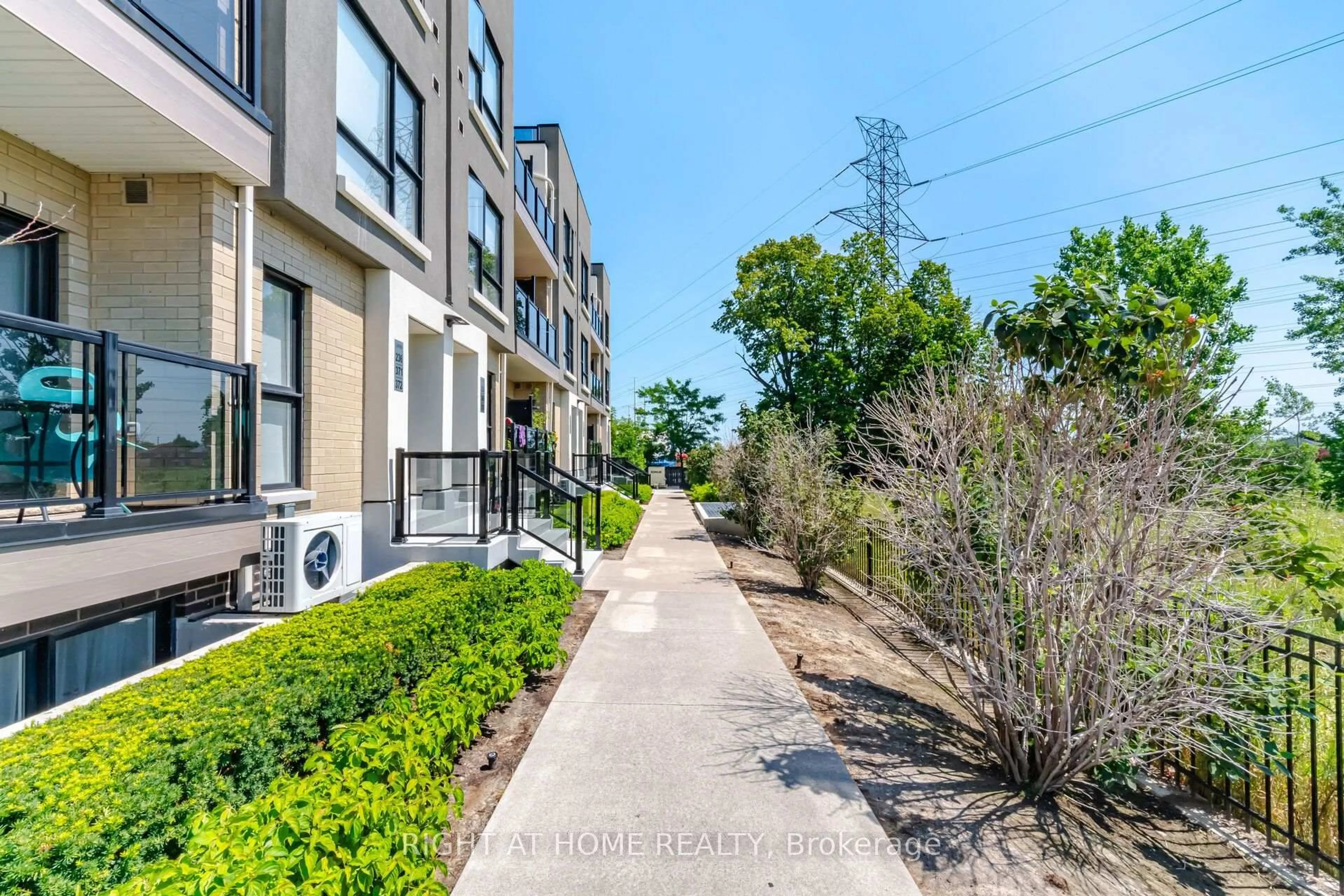 A pic from outside/outdoor area/front of a property/back of a property/a pic from drone, street for 515 Kingbird Grve #233, Toronto Ontario M1B 5R7