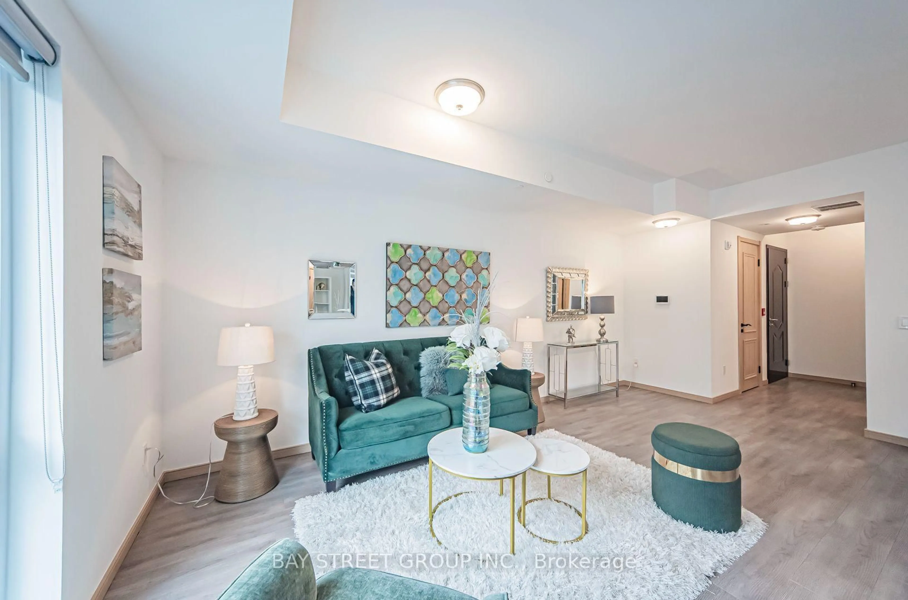 Living room with furniture, unknown for 50 Morecambe Gate #B308, Toronto Ontario M1W 0A9