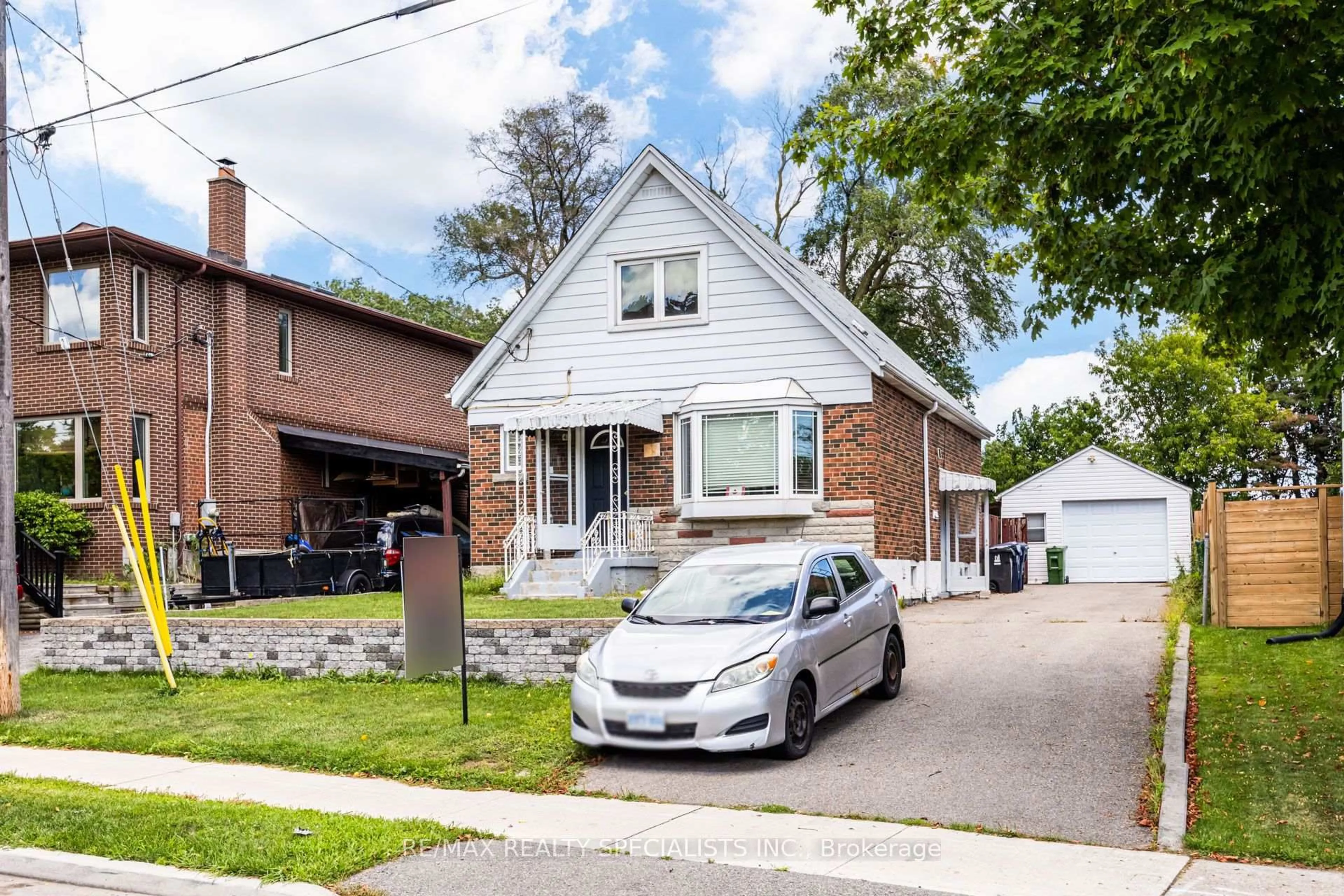 Home with brick exterior material, street for 47 Singleton Rd, Toronto Ontario M1R 1H8