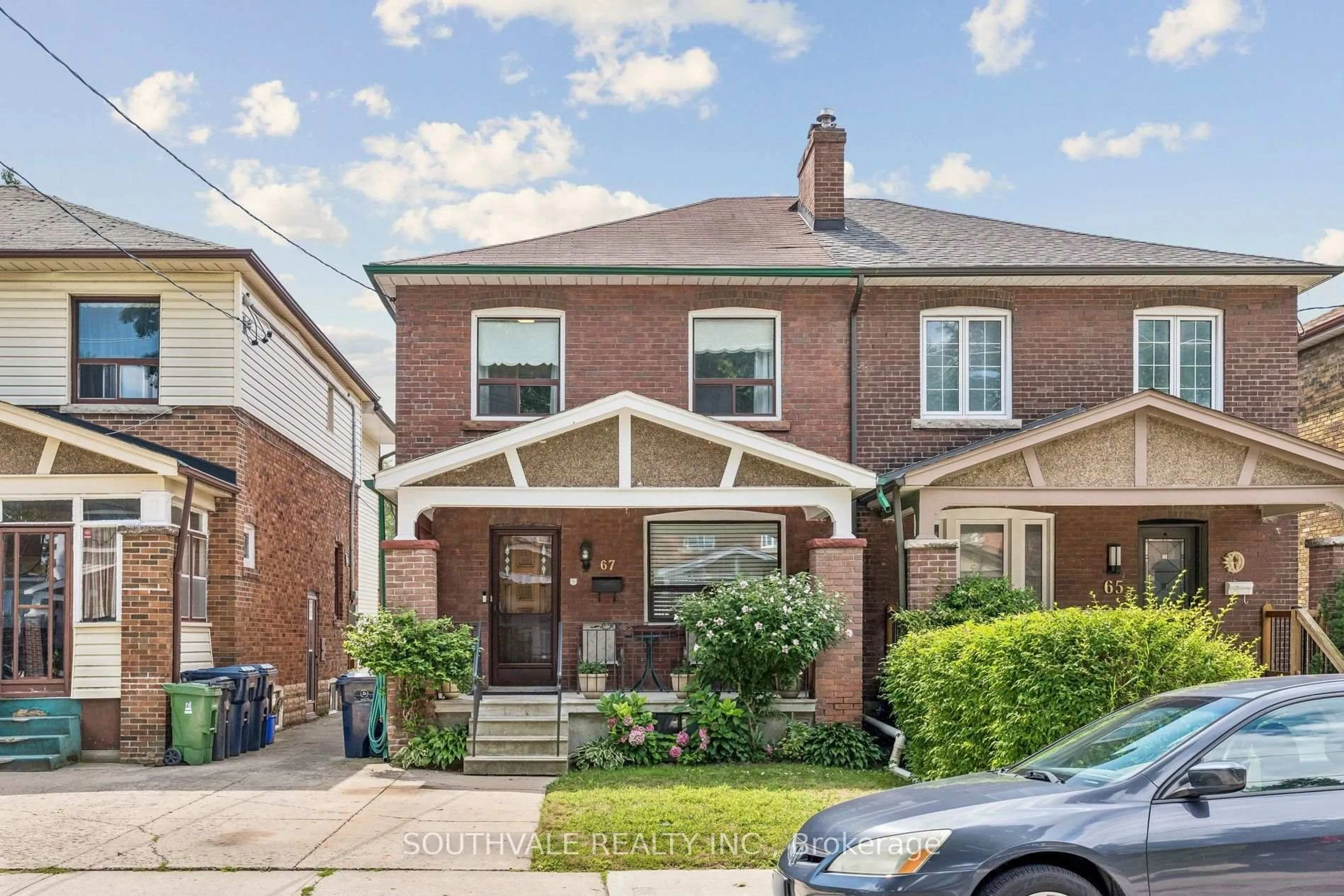 Home with brick exterior material, street for 67 Kings Park Blvd, Toronto Ontario M4J 2B9