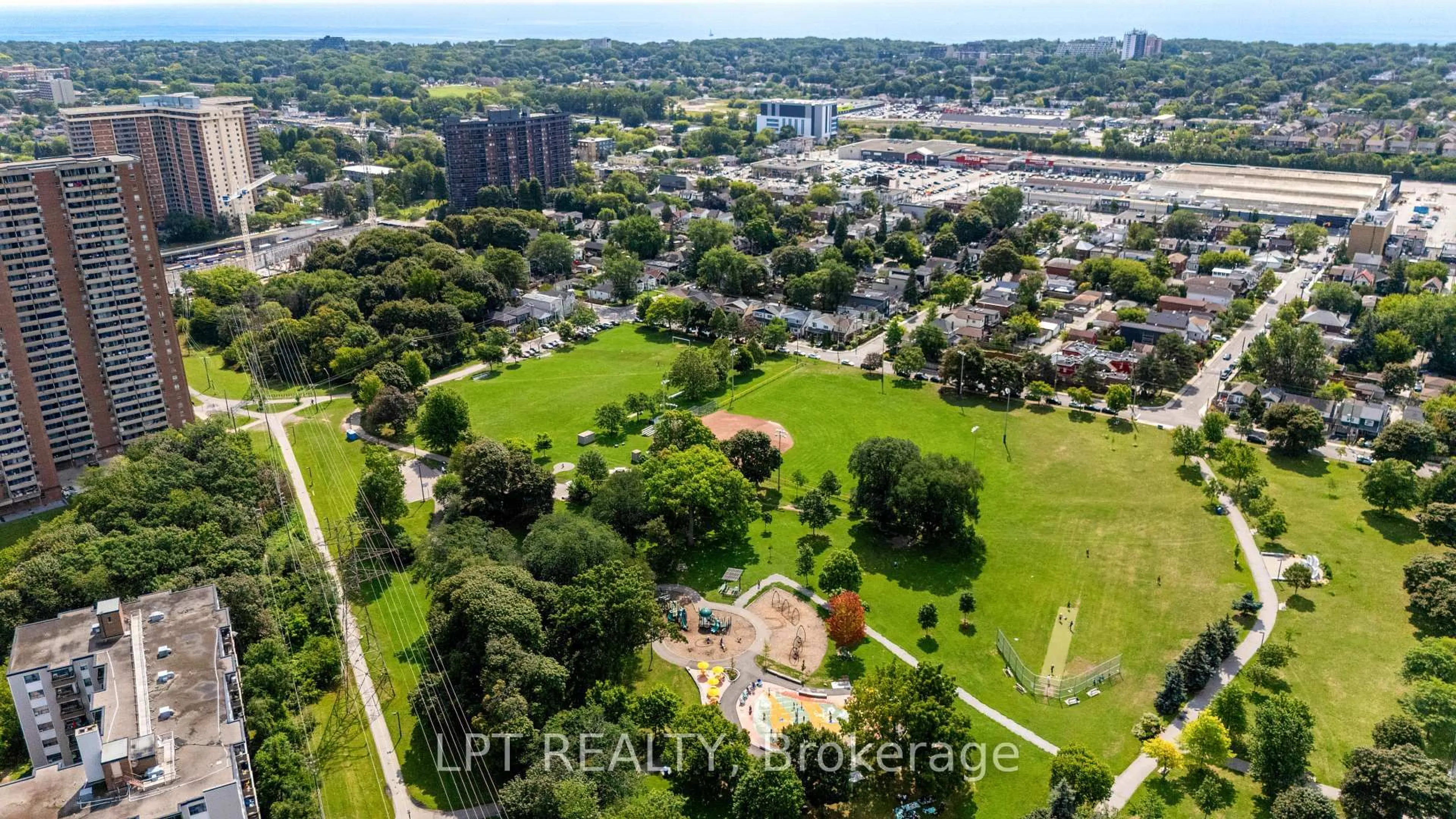A pic from outside/outdoor area/front of a property/back of a property/a pic from drone, unknown for 5 Massey Sq #2811, Toronto Ontario M4C 5L6