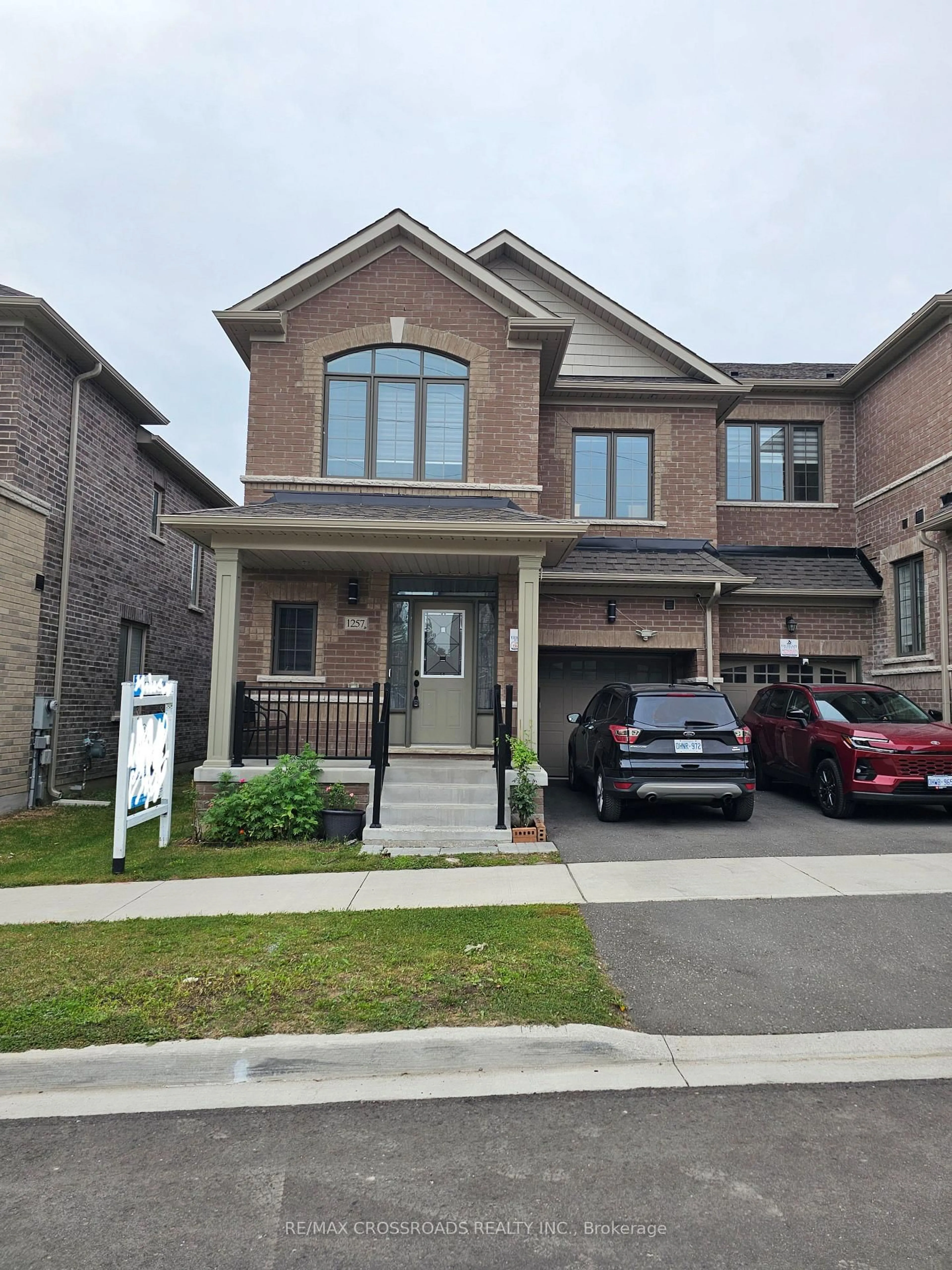 Home with brick exterior material, street for 1257 Aquarius Tr, Pickering Ontario L1X 0L9