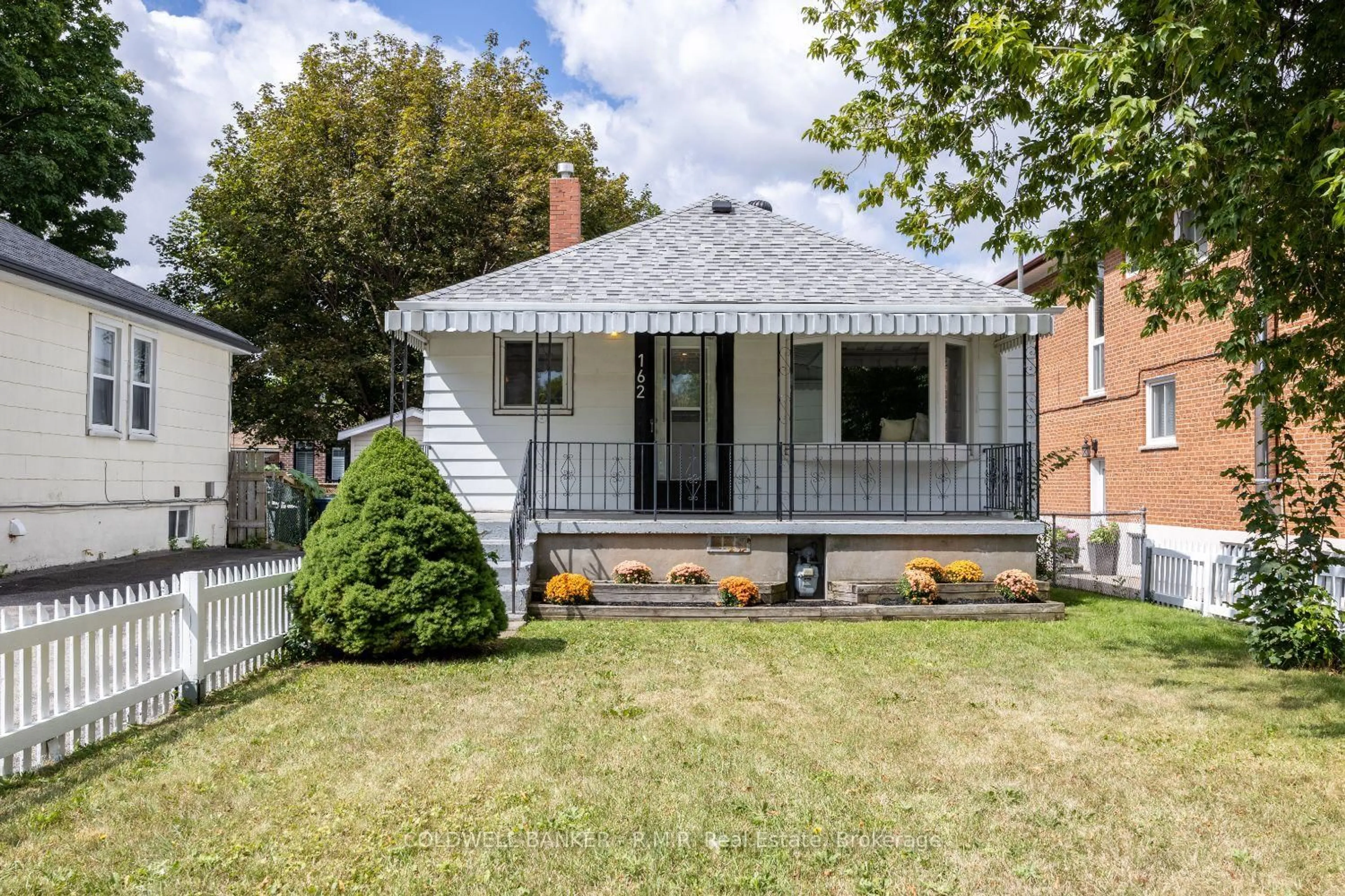 Home with brick exterior material, street for 162 Magnolia Ave, Toronto Ontario M1K 3K8