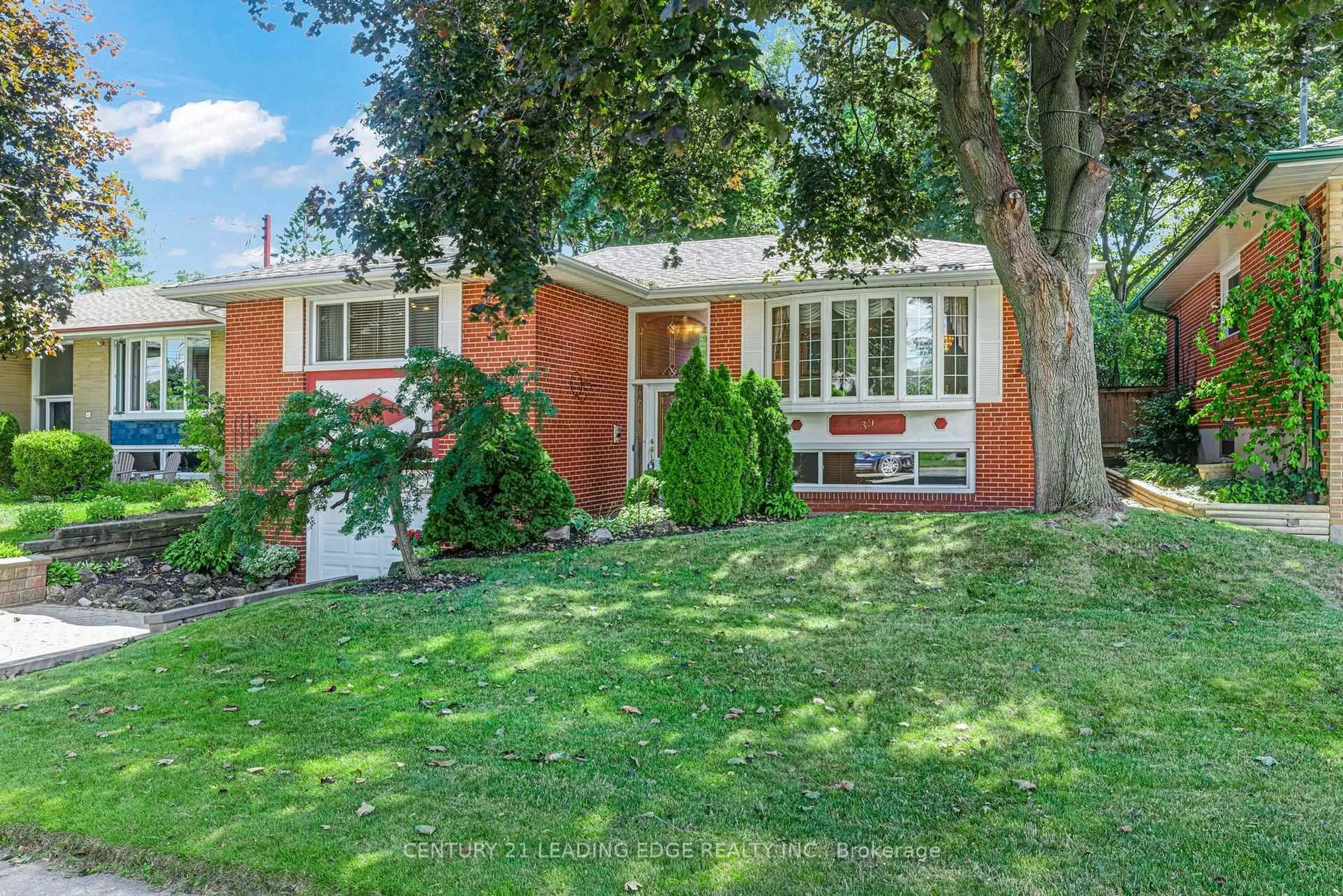 Home with brick exterior material, street for 39 Wantanopa Cres, Toronto Ontario M1H 2B2