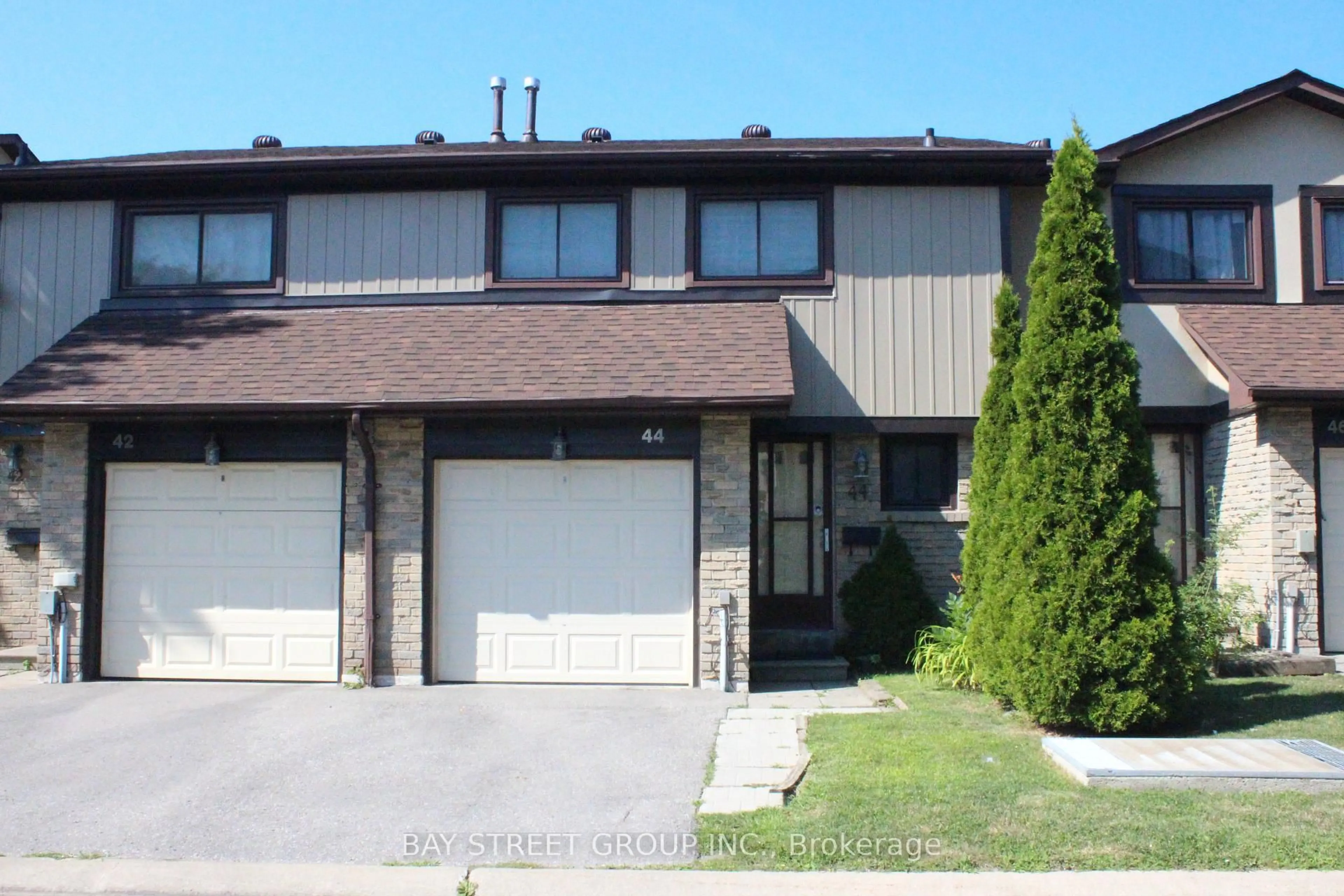 Home with vinyl exterior material, street for 29 Fundy Bay Blvd #44, Toronto Ontario M1W 3A2