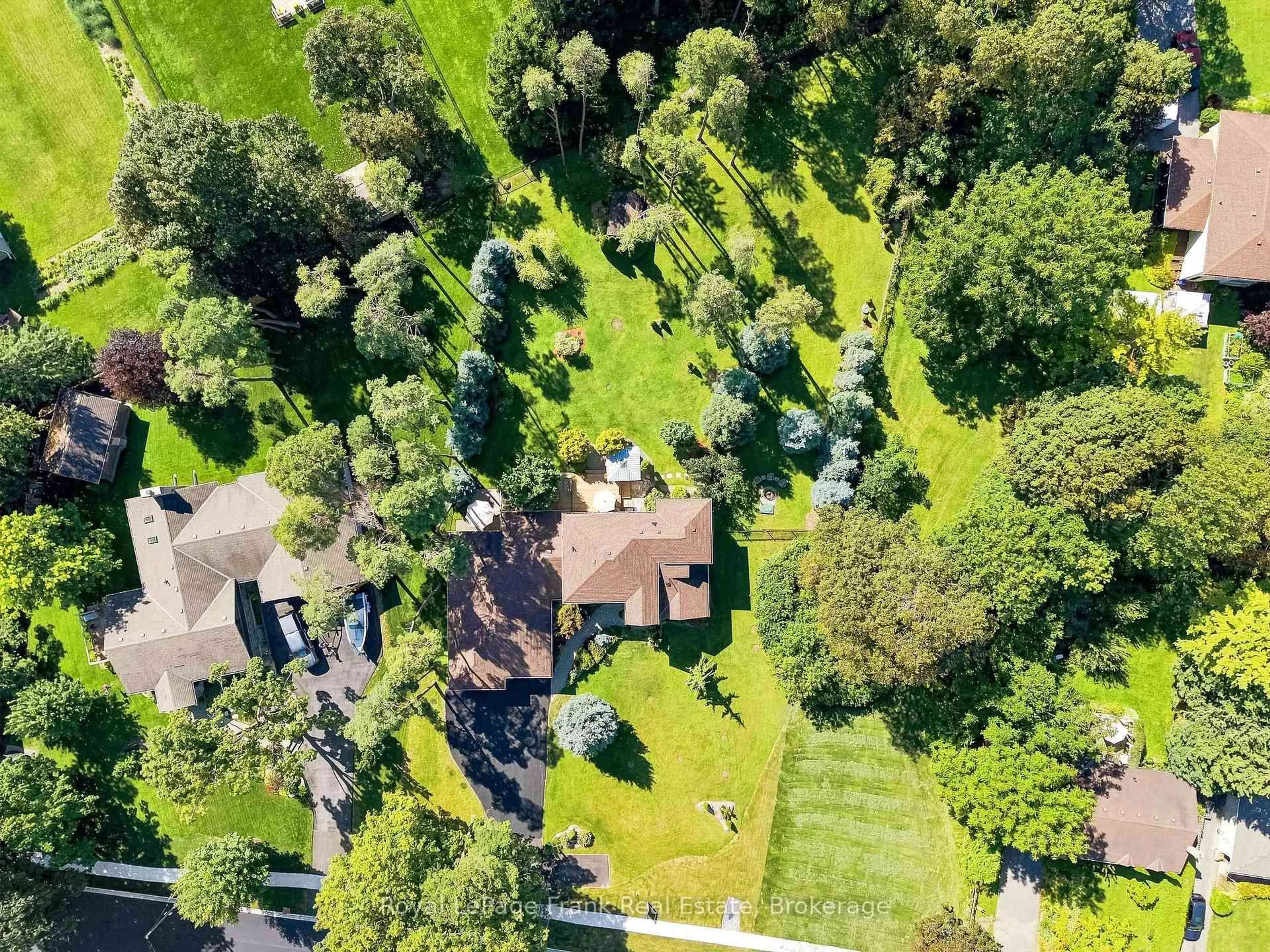 A pic from outside/outdoor area/front of a property/back of a property/a pic from drone, forest/trees view for 270 Union Ave, Scugog Ontario L9L 1C1