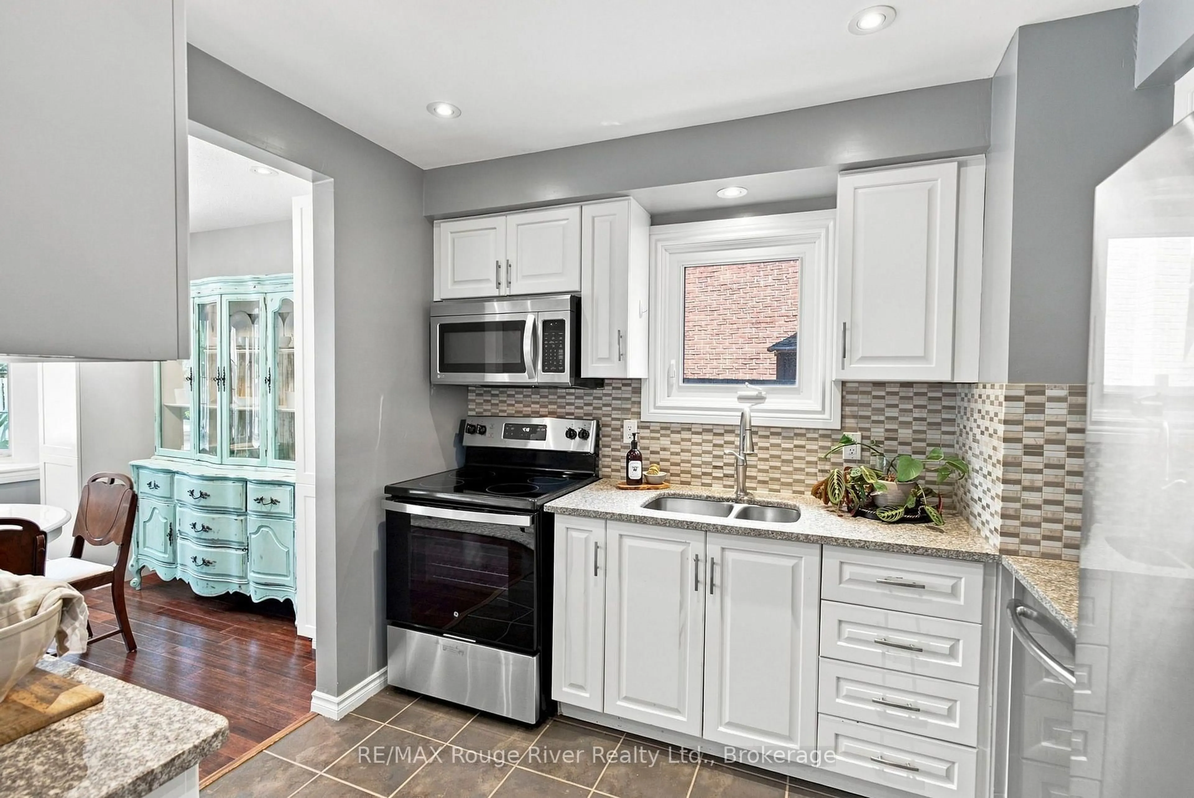 Open concept kitchen, ceramic/tile floor for 49 Fisher Cres, Ajax Ontario L1T 2E8