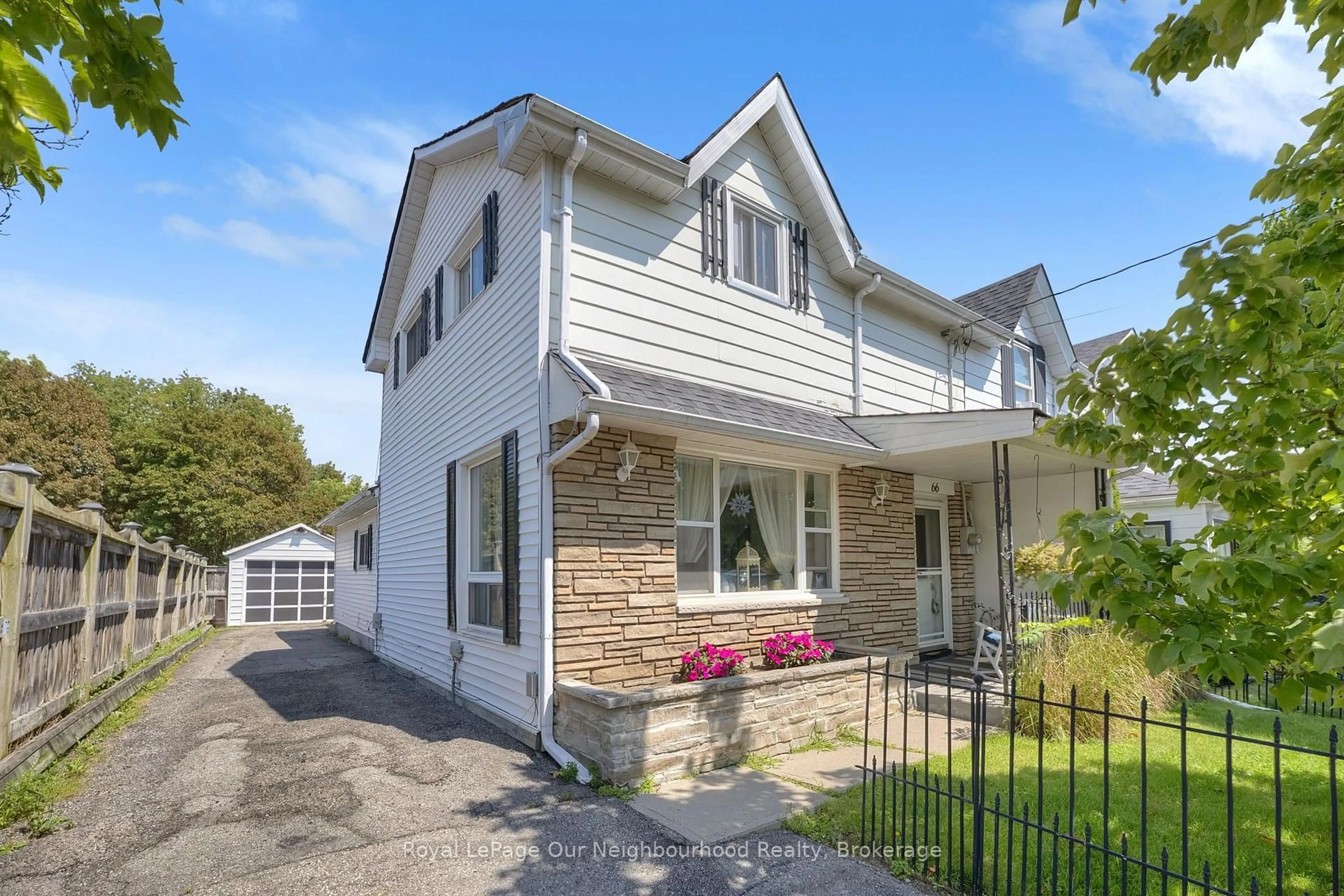 Home with vinyl exterior material, street for 66 Wellington St, Clarington Ontario L1C 1V5