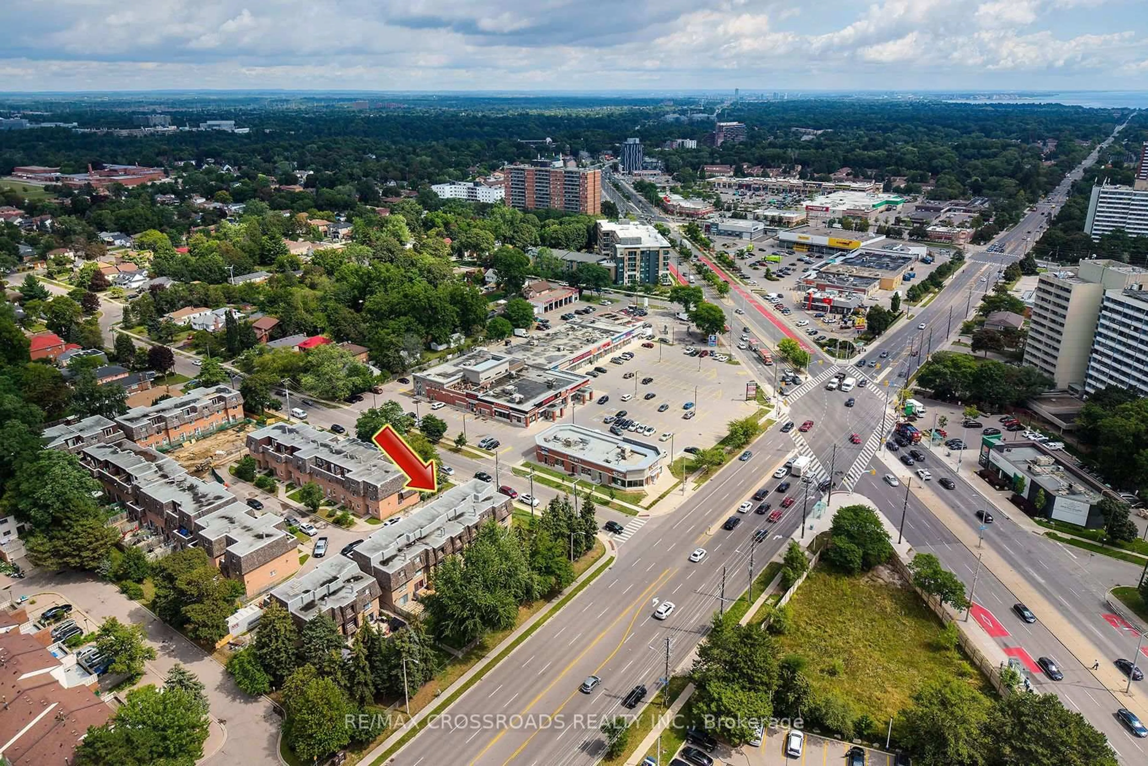 A pic from outside/outdoor area/front of a property/back of a property/a pic from drone, unknown for 10 Rodda Blvd #65, Toronto Ontario M1E 2Z6
