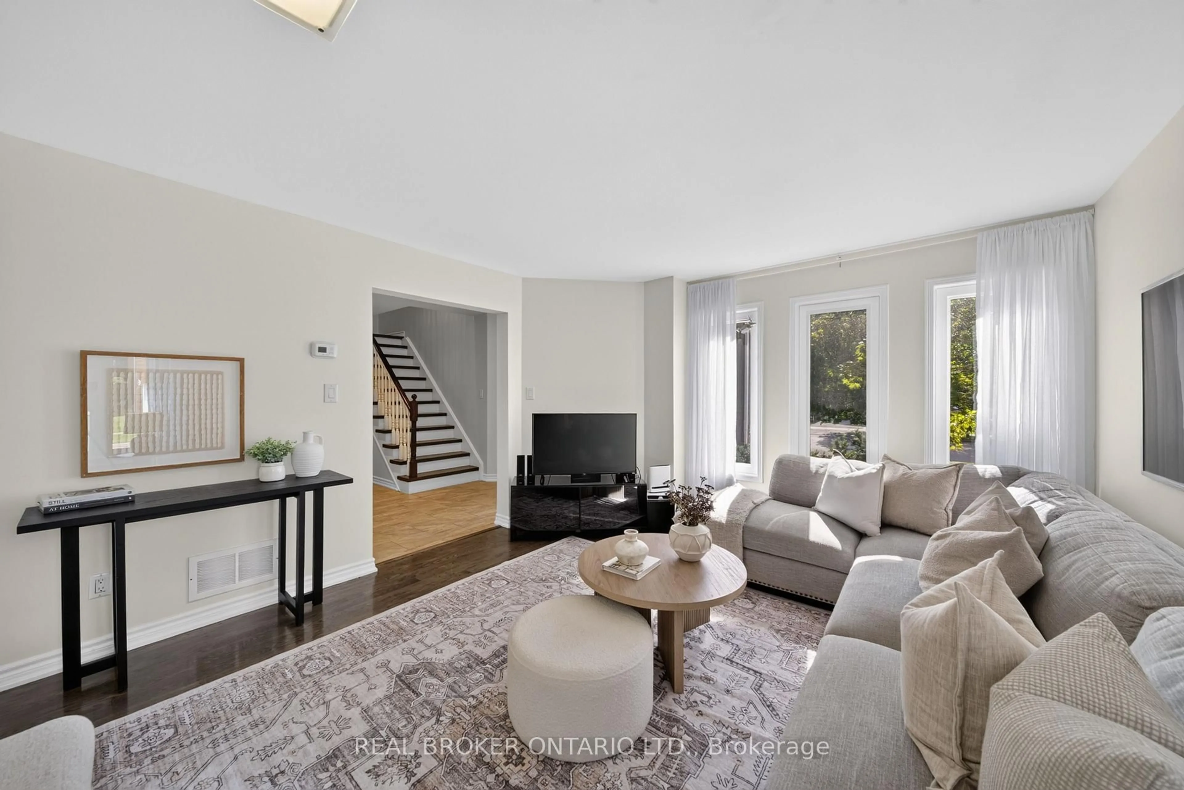 Living room with furniture, unknown for 63 Eric Clarke Dr, Whitby Ontario L1R 2H6