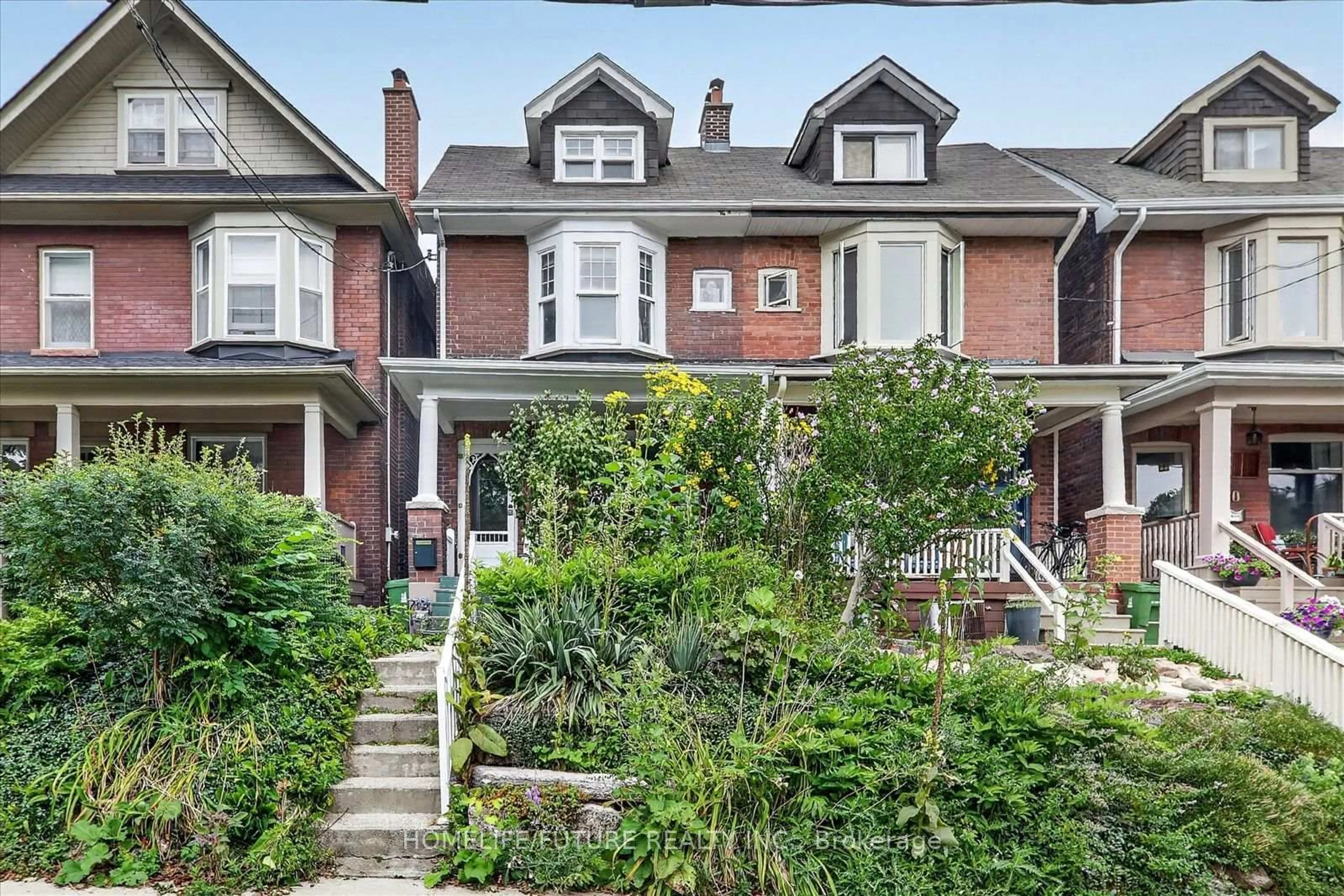 Home with brick exterior material, street for 56 Sparkhall Ave, Toronto Ontario M4K 1G6