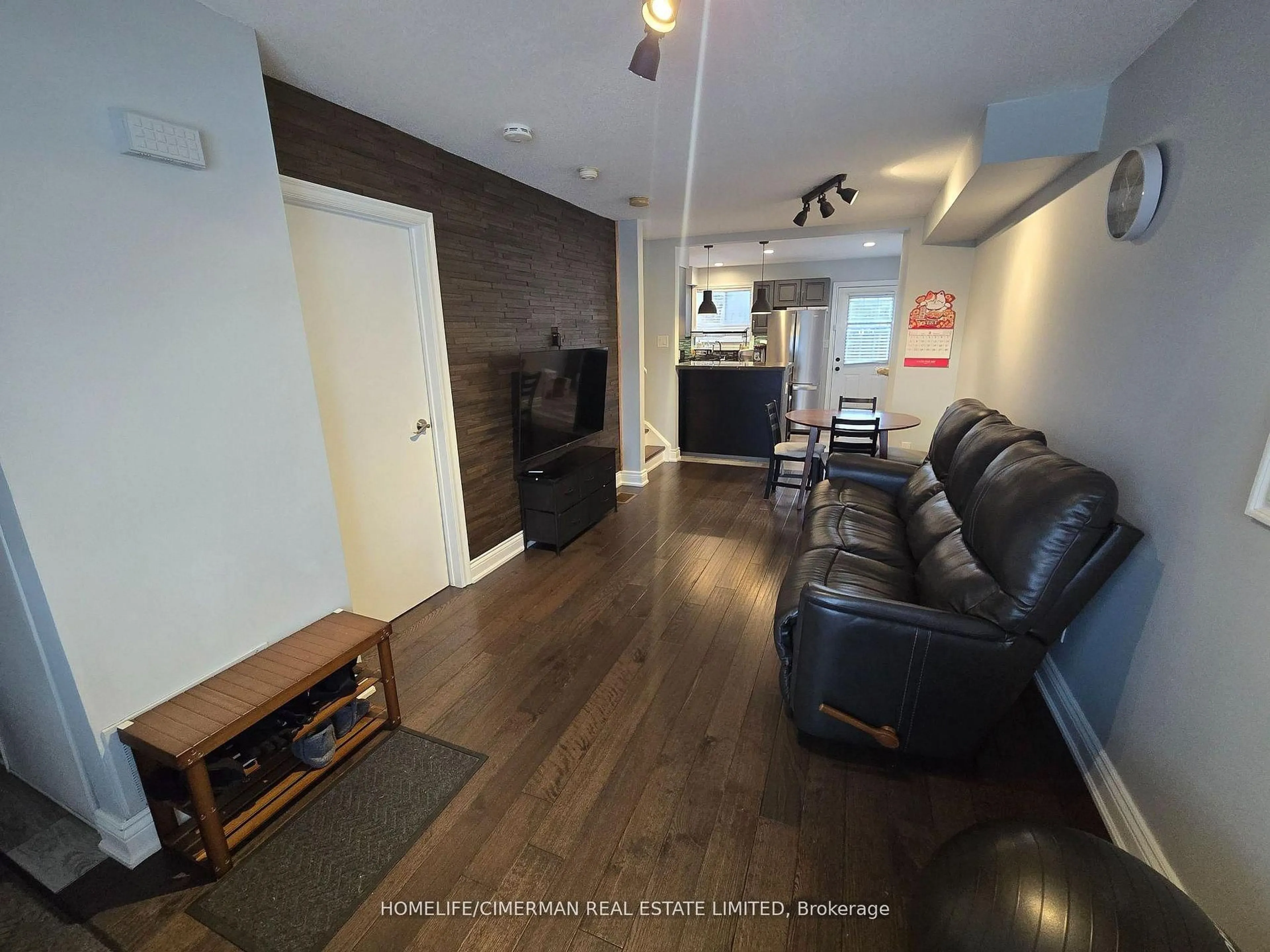 Living room with furniture, wood/laminate floor for 4277 Lawrence Ave #6, Toronto Ontario M1E 2S8