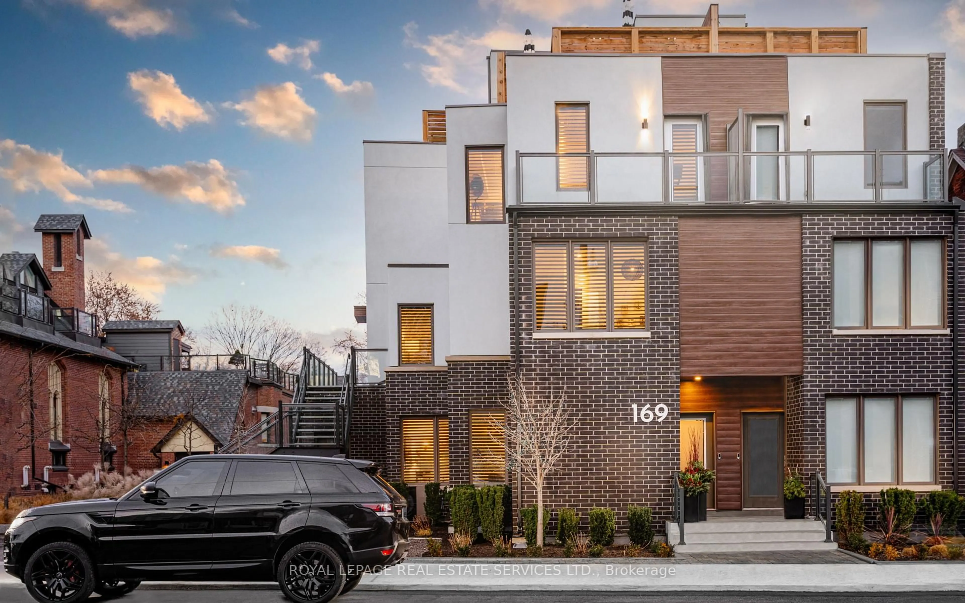 Home with brick exterior material, street for 169 Jones Ave #2, Toronto Ontario M4M 3A2