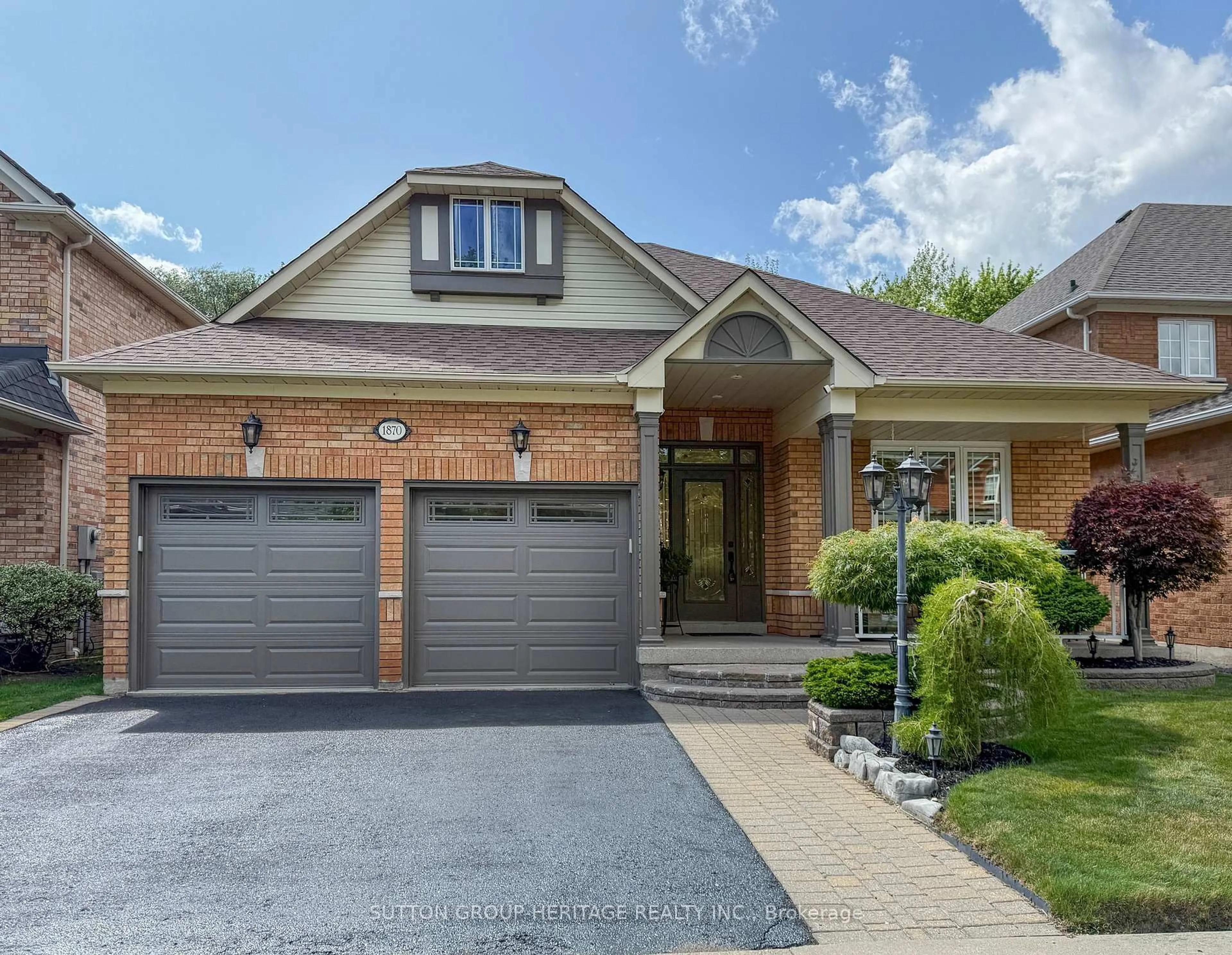 Home with brick exterior material, street for 1870 Falconwood Way, Pickering Ontario L1V 7C3