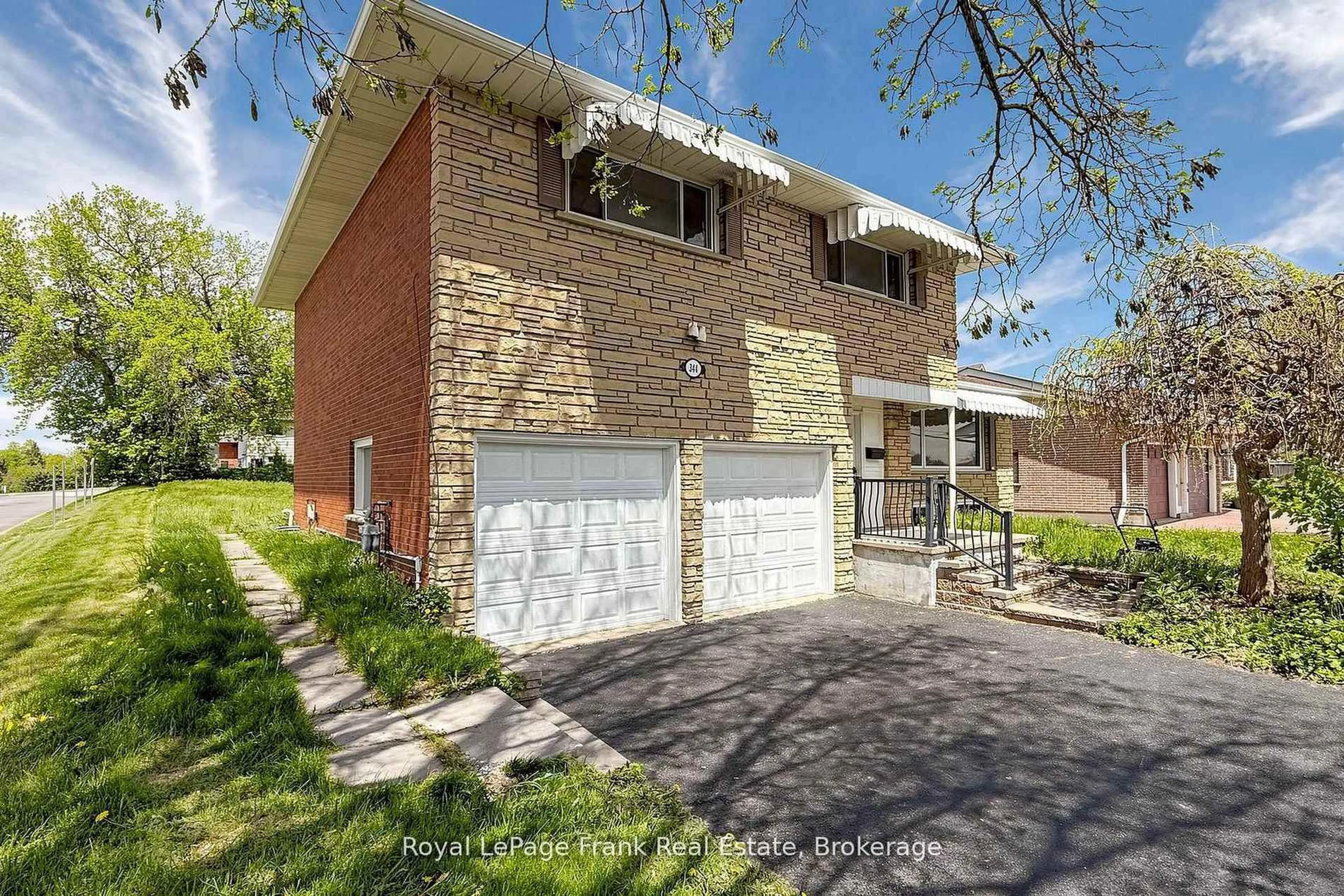 Home with brick exterior material, street for 344 Rossland Rd, Oshawa Ontario L1G 2X1