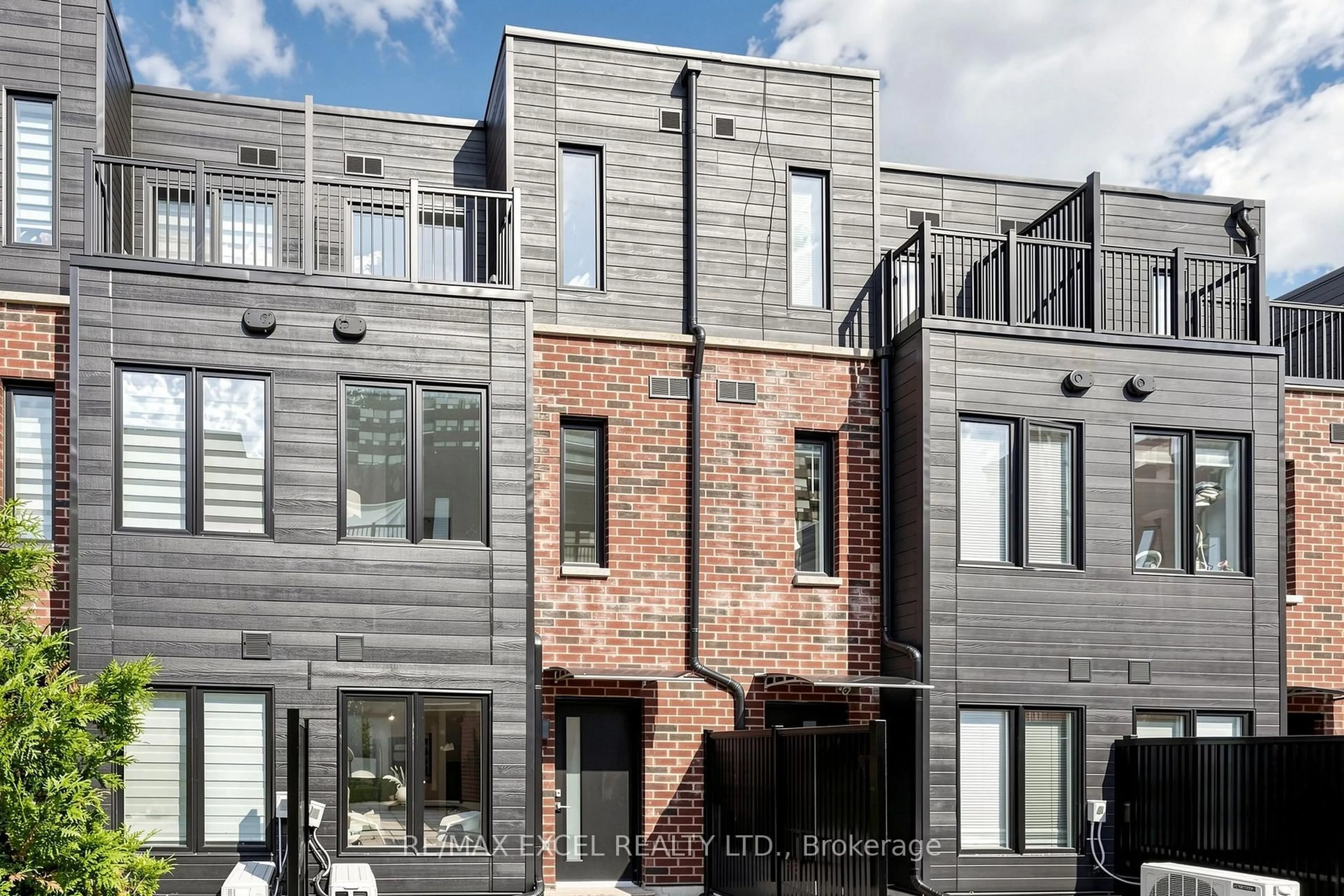 Home with brick exterior material, street for 30 Calamint Lane #46, Toronto Ontario M1W 2H1