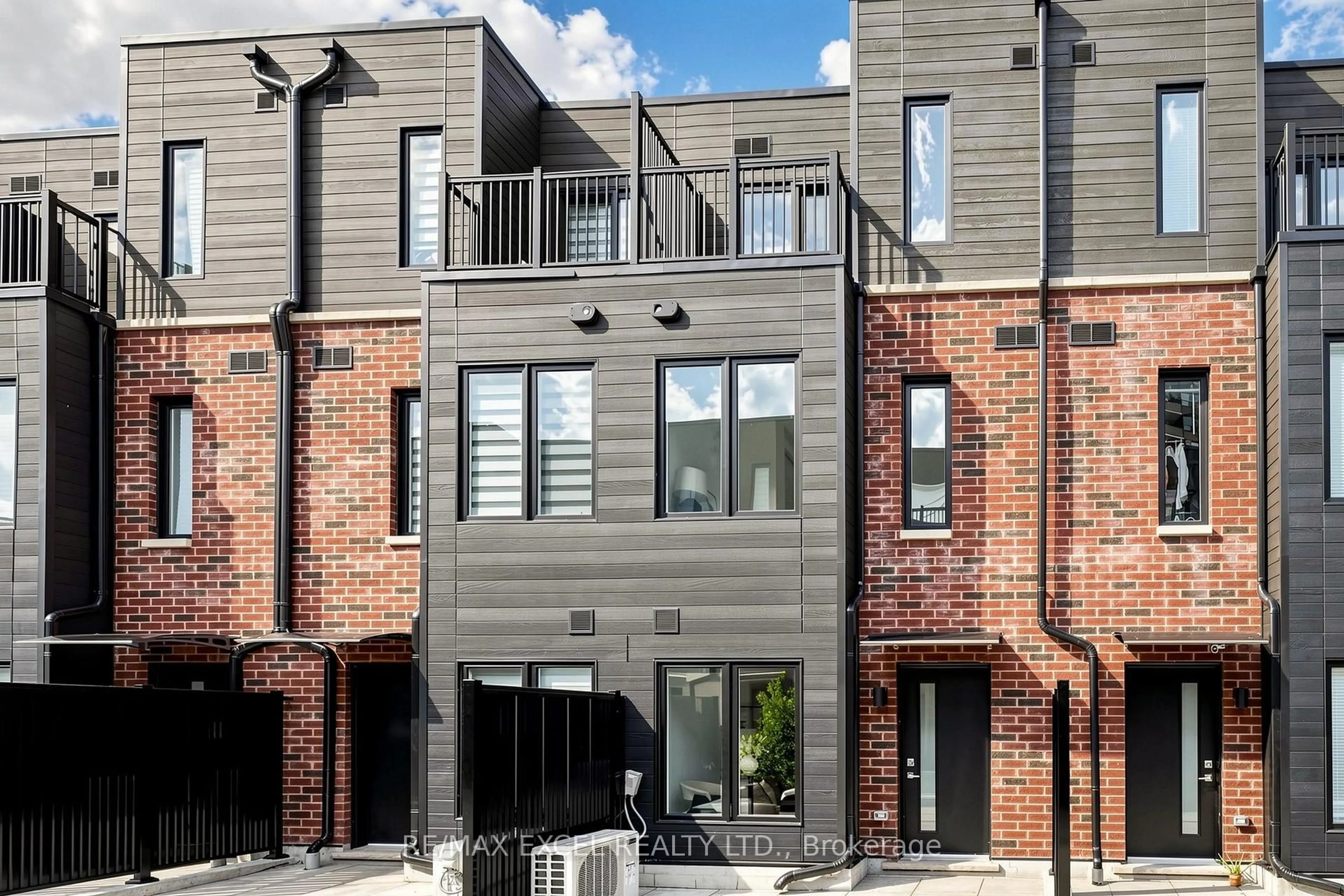 Home with brick exterior material, street for 30 Calamint Lane #46, Toronto Ontario M1W 2H1