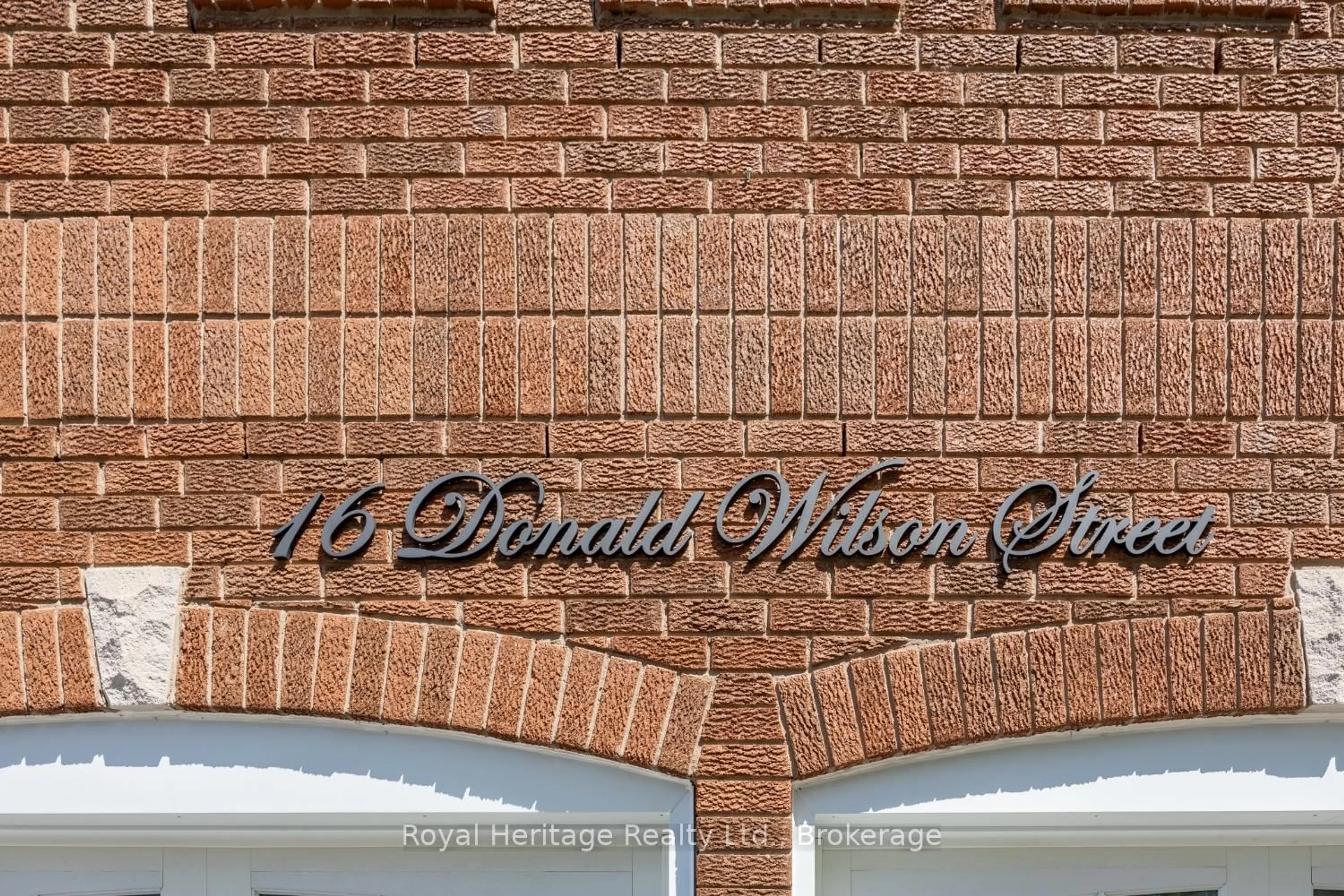 Home with brick exterior material, street for 16 Donald Wilson St, Whitby Ontario L1R 2H5