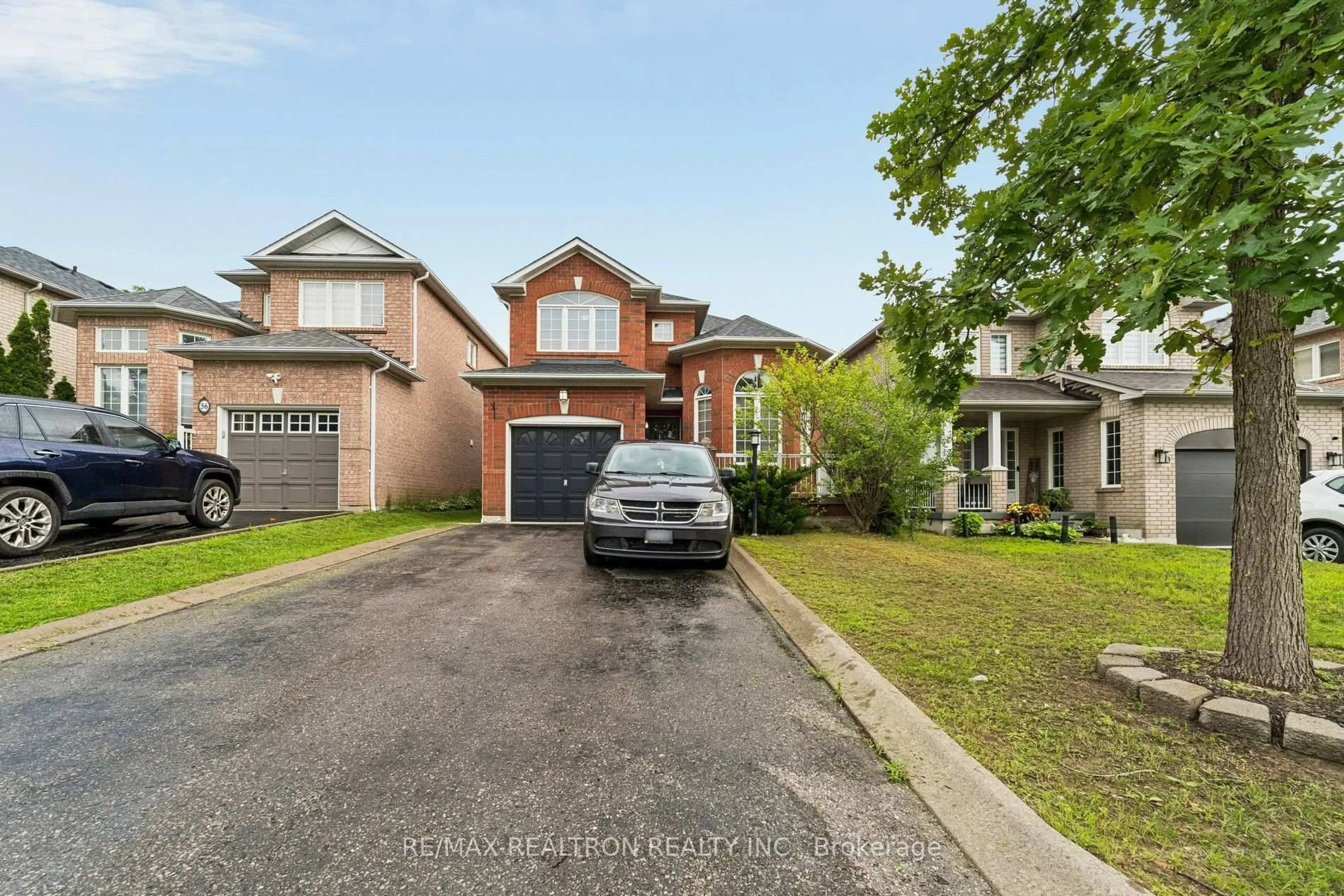 Home with brick exterior material, street for 58 Lurosa Cres, Whitby Ontario L1R 3A9