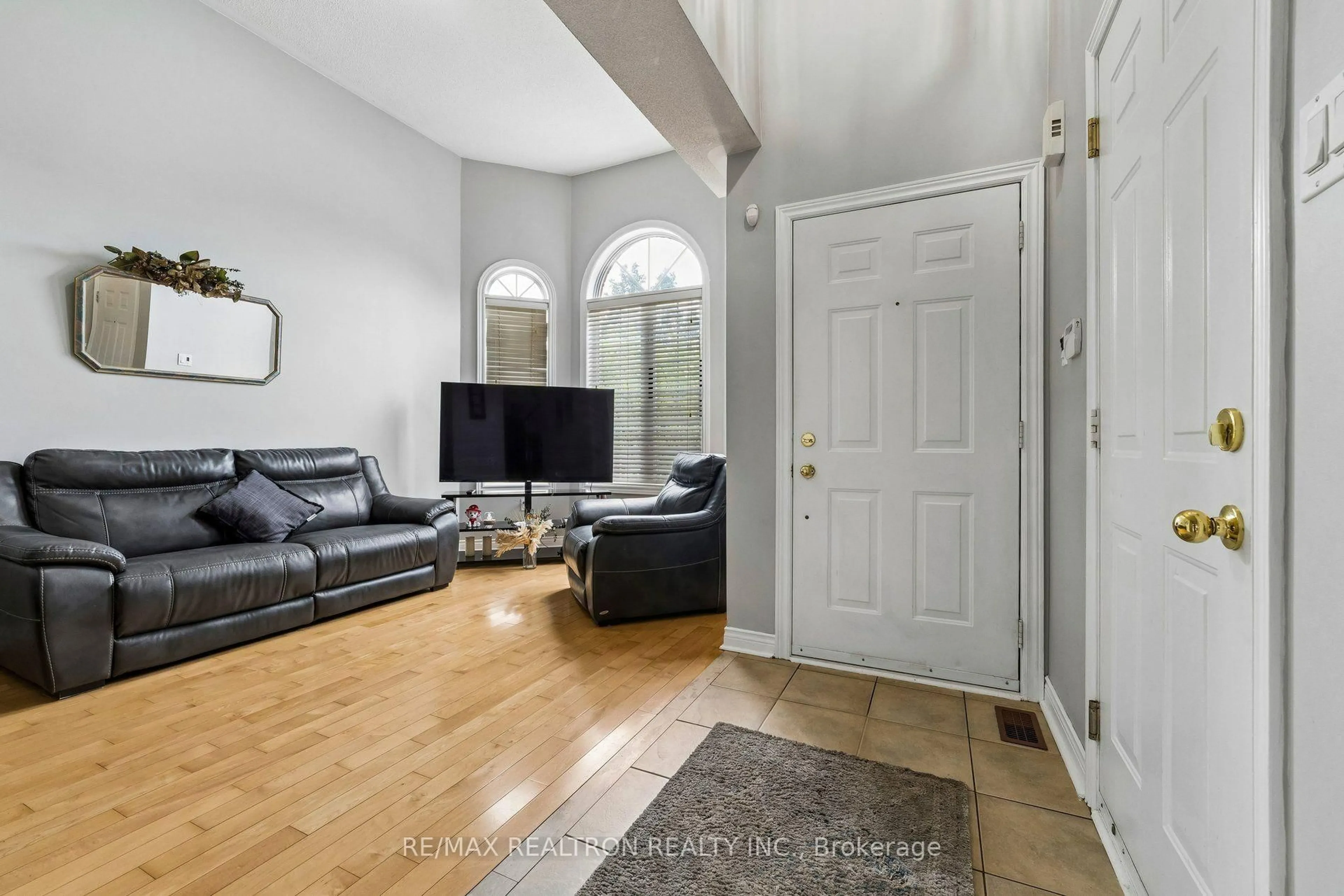 Living room with furniture, unknown for 58 Lurosa Cres, Whitby Ontario L1R 3A9