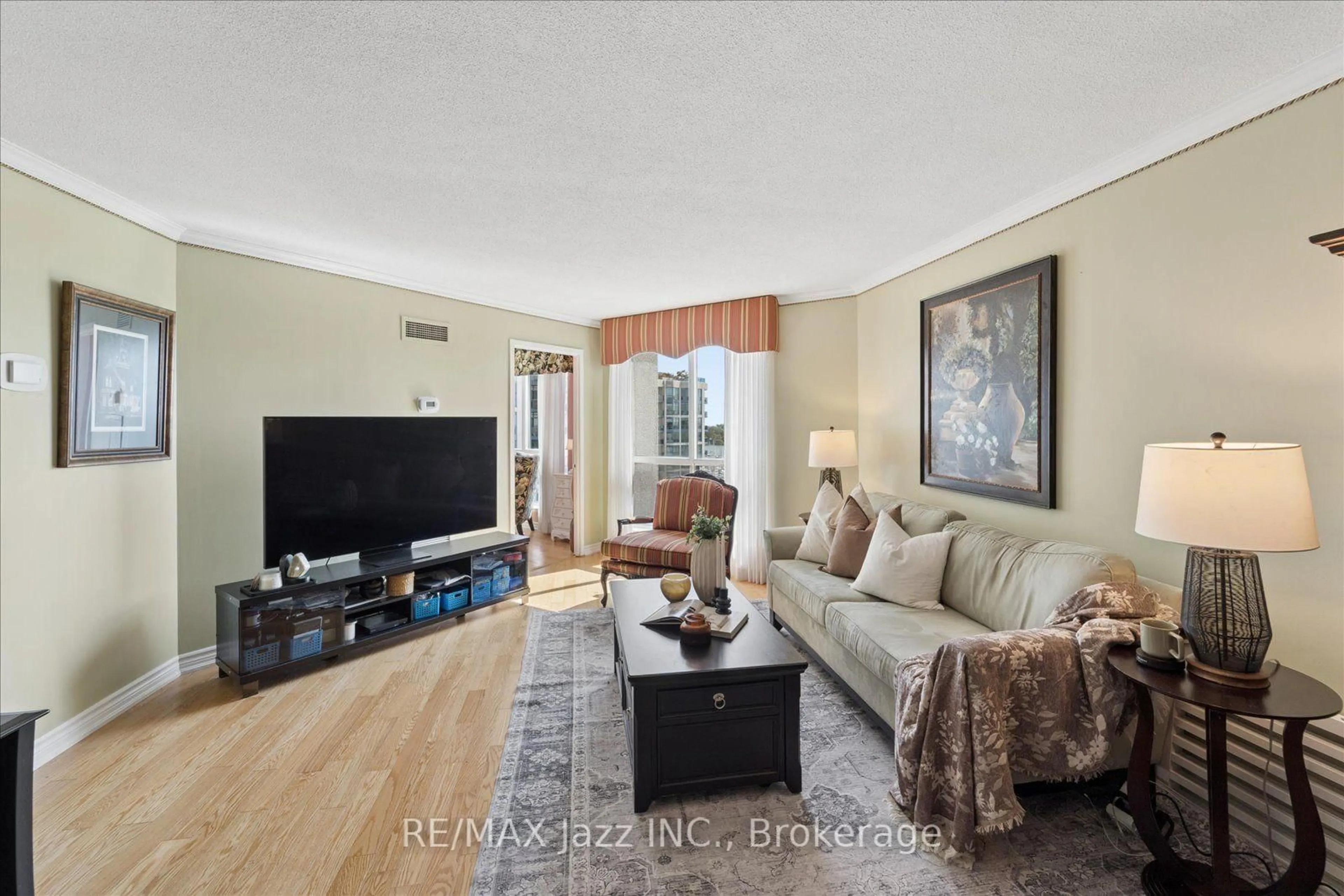Living room with furniture, wood/laminate floor for 360 Watson St #1003, Whitby Ontario L1H 6P1