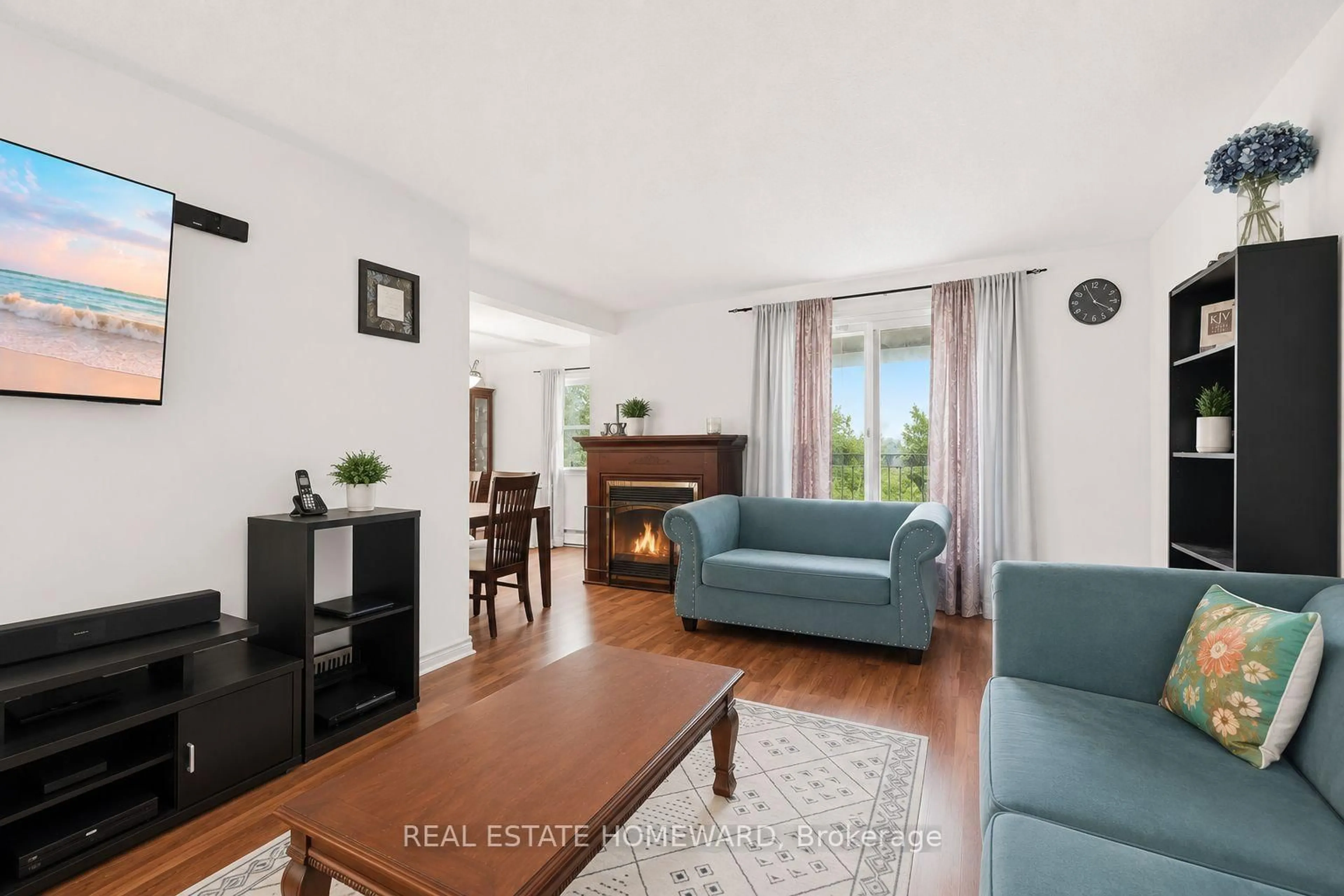 Living room with furniture, wood/laminate floor for 1360 Glenanna Rd #17A, Pickering Ontario L1V 2T5