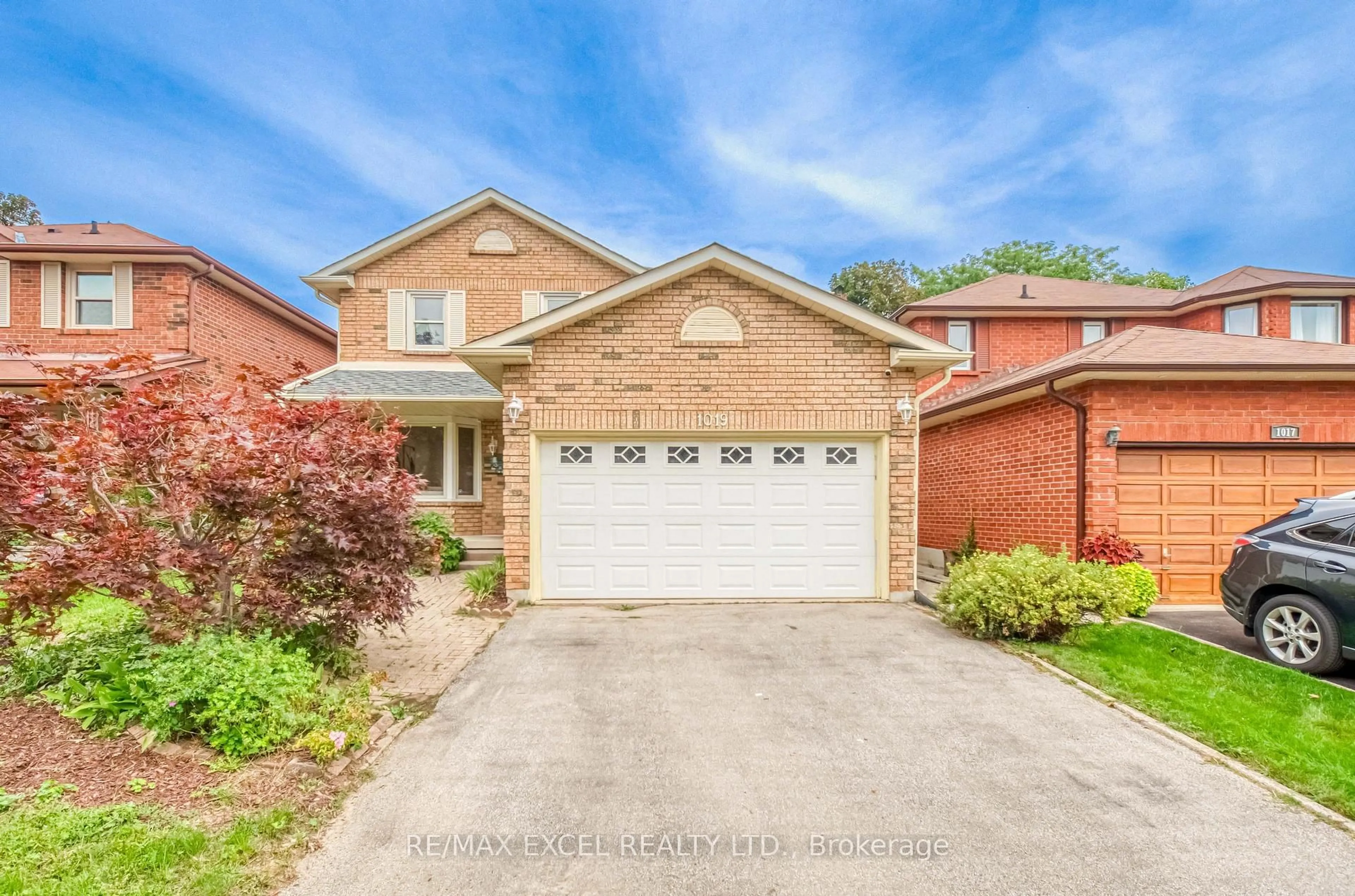Home with brick exterior material, street for 1019 Rouge Valley Dr, Pickering Ontario L1V 4N8