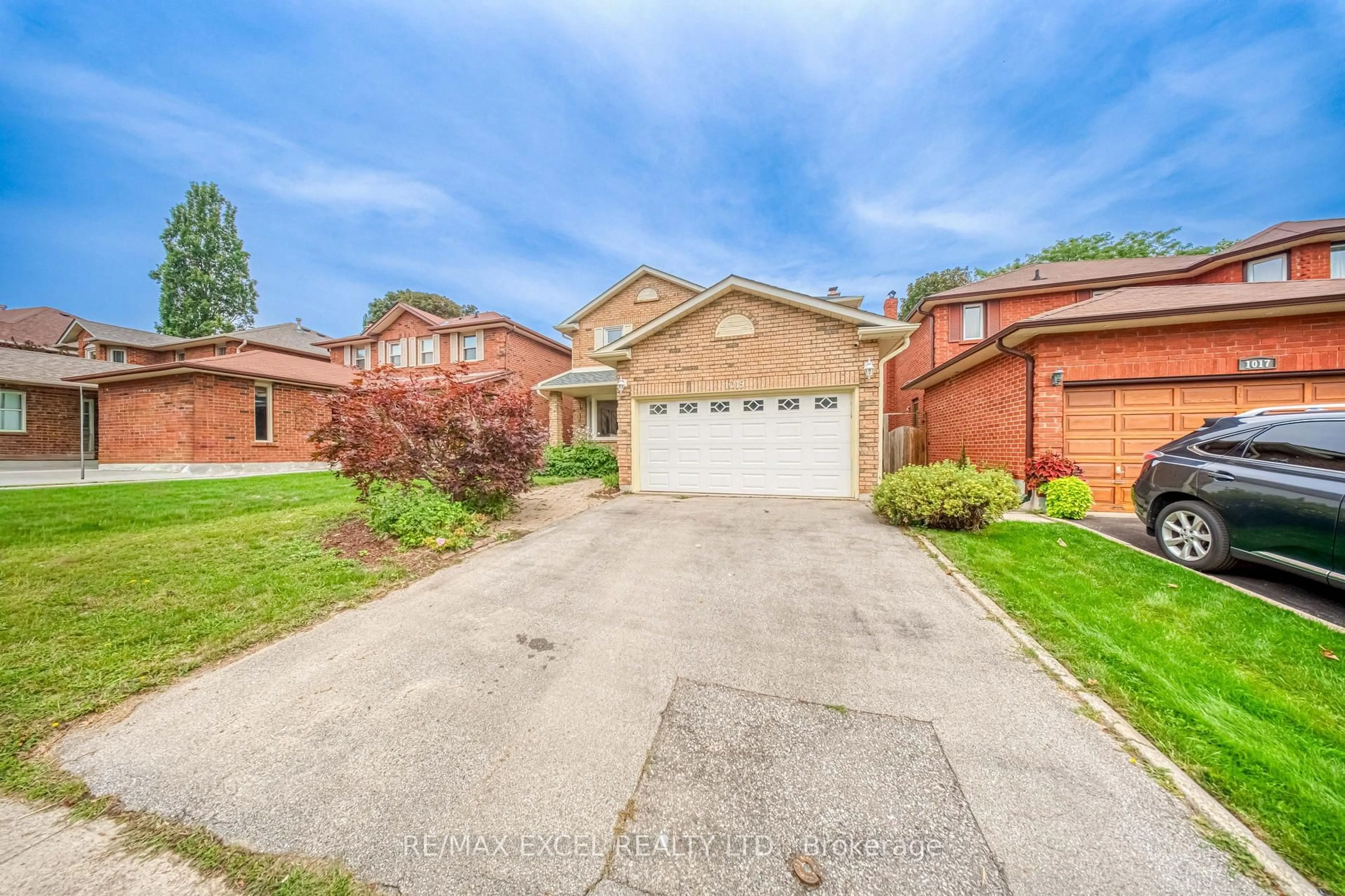 Home with brick exterior material, street for 1019 Rouge Valley Dr, Pickering Ontario L1V 4N8