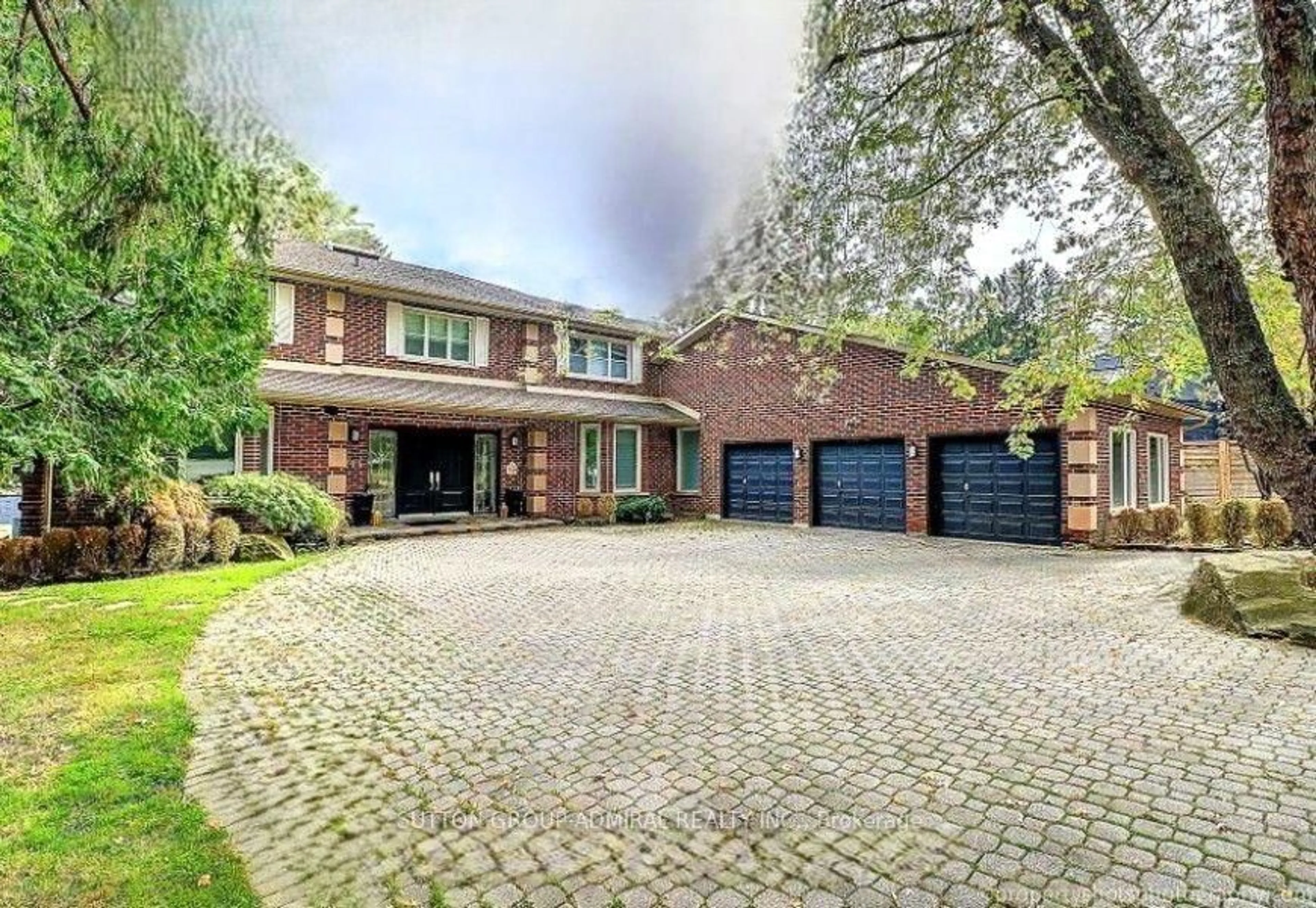 Home with brick exterior material, street for 48 Meadowcliffe Dr, Toronto Ontario M1M 2X9