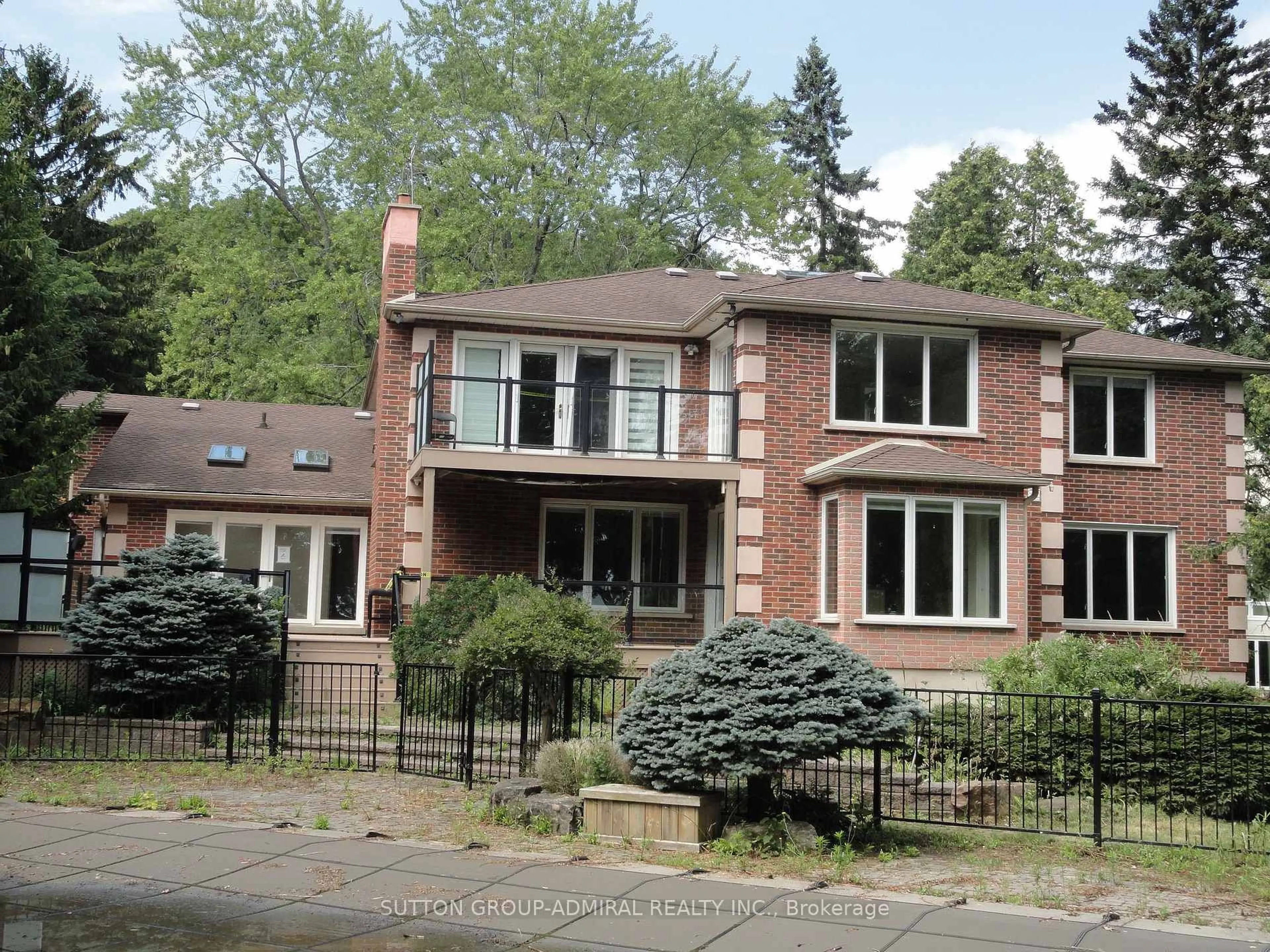 Home with brick exterior material, street for 48 Meadowcliffe Dr, Toronto Ontario M1M 2X9