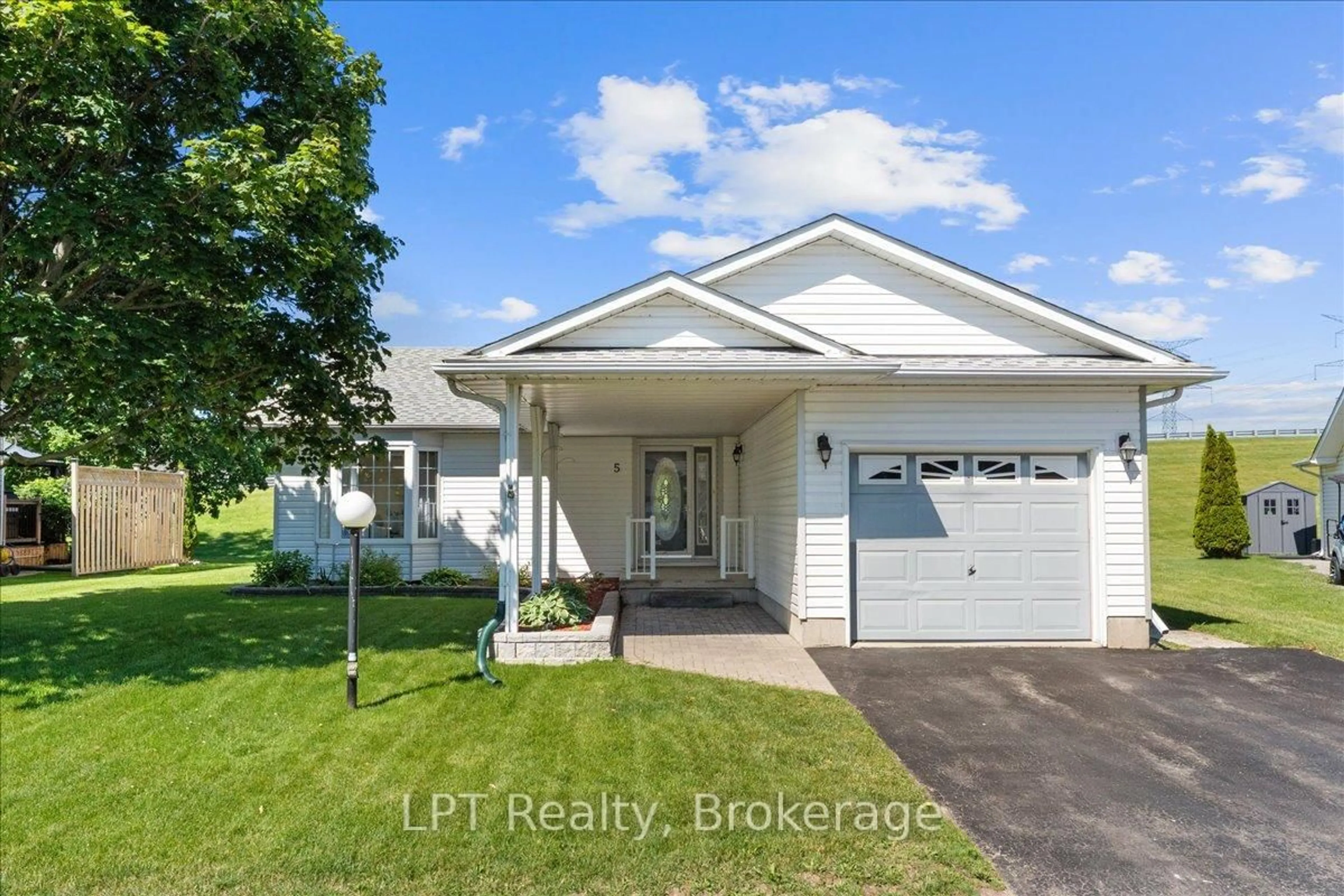 Home with vinyl exterior material, street for 5 Niagara Tr, Clarington Ontario L1B 1A2