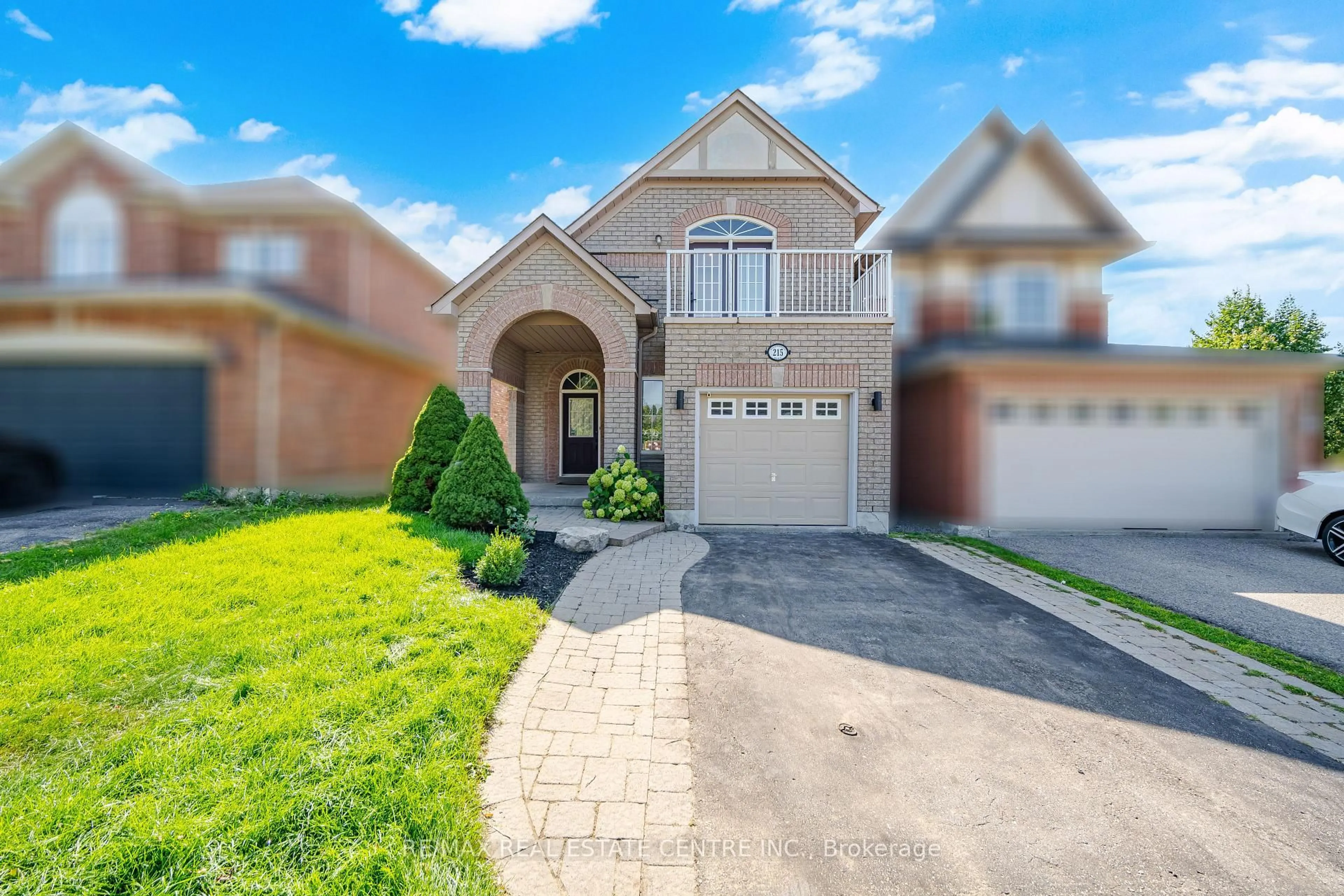 Home with brick exterior material, street for 215 Willowbrook Dr, Whitby Ontario L1R 2Y7