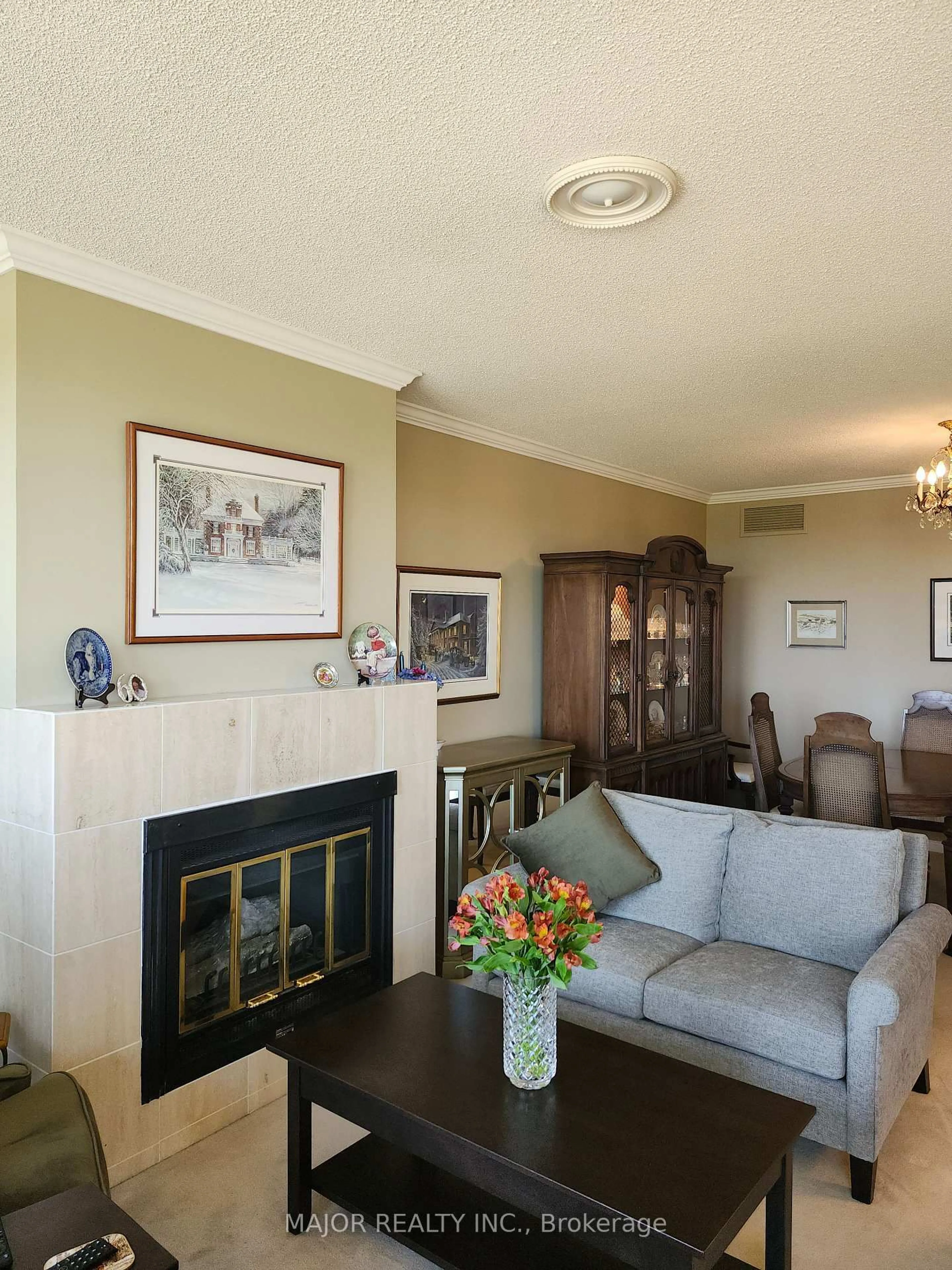 Living room with furniture, wood/laminate floor for 900 Wilson Rd #1403, Oshawa Ontario L1G 7T2