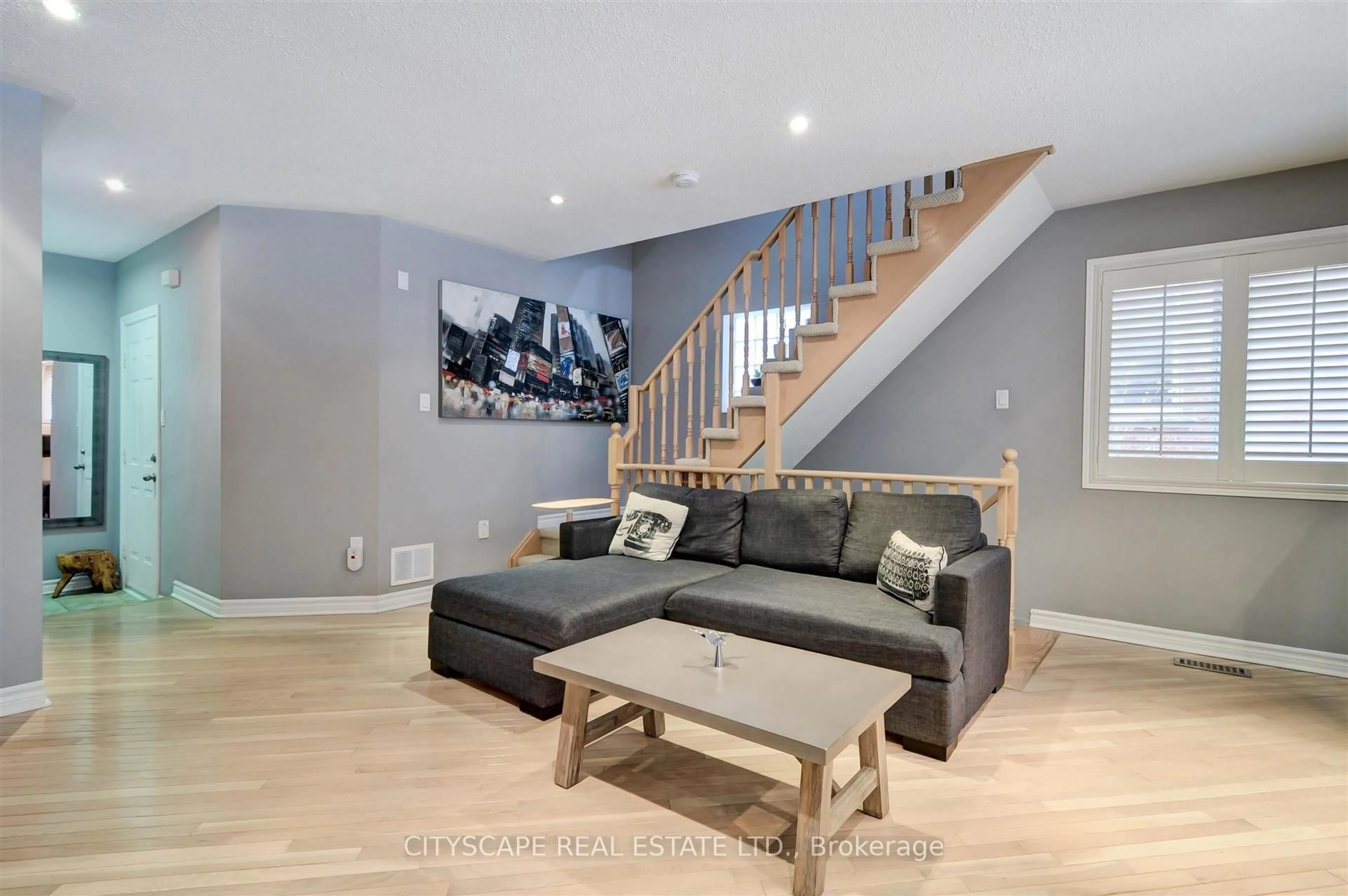 Living room with furniture, wood/laminate floor for 353 Sparrow Circ, Pickering Ontario L1V 7E6