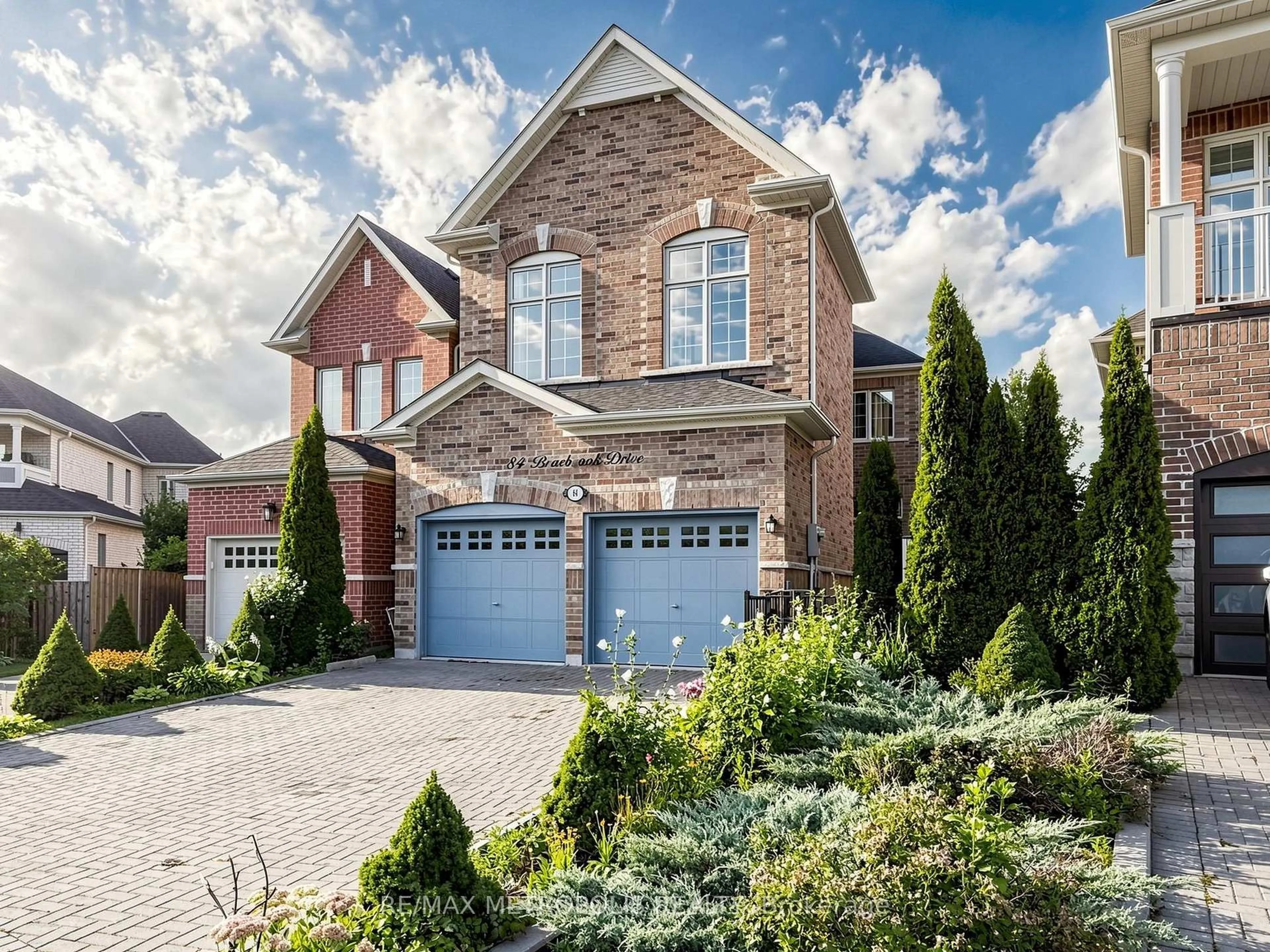 Home with brick exterior material, street for 84 Braebrook Dr, Whitby Ontario L1R 0M9
