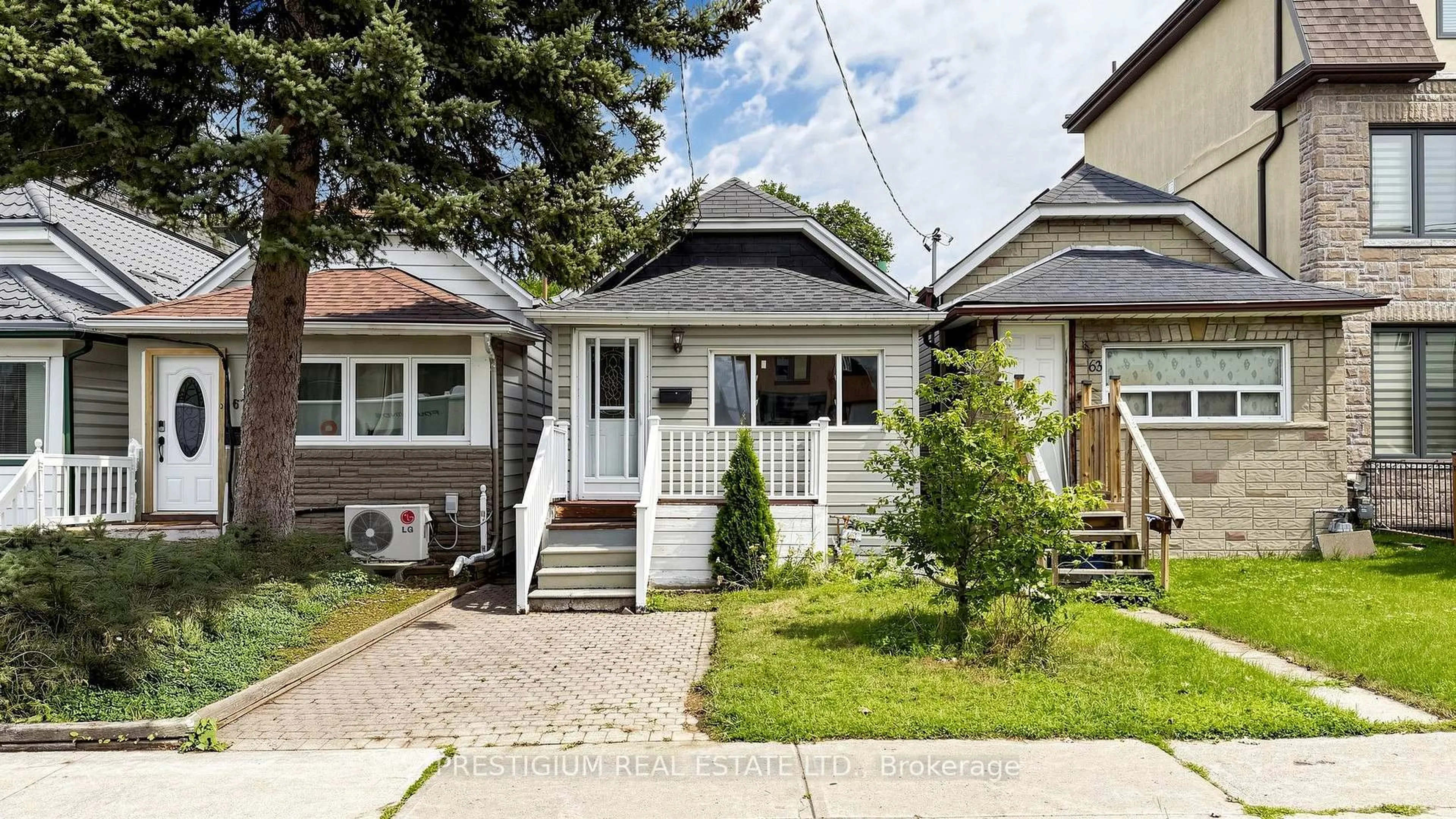 Home with vinyl exterior material, street for 65 Eldon Ave, Toronto Ontario M4C 5G2