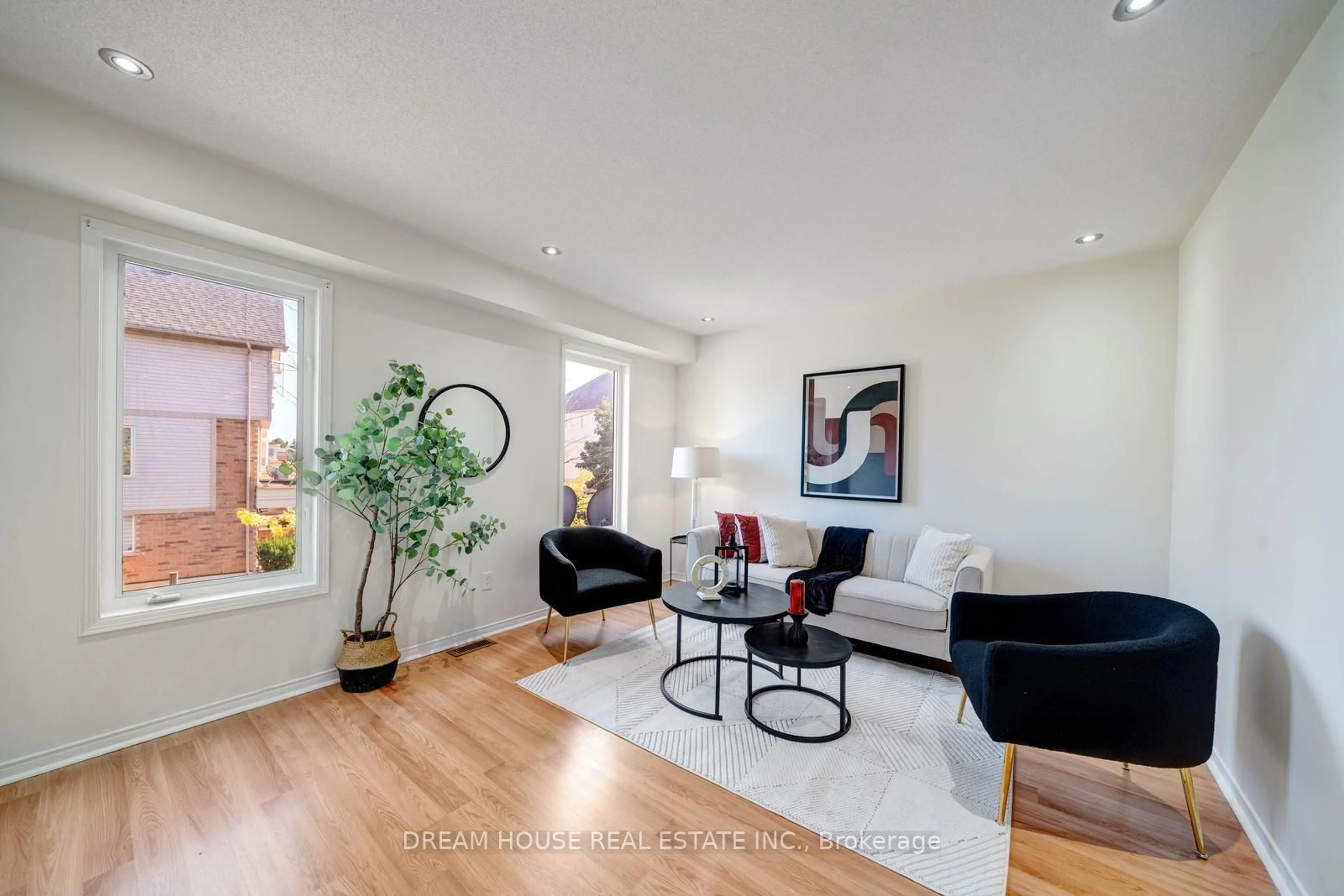 Living room with furniture, wood/laminate floor for 68 Mcgonigal Lane, Ajax Ontario L1T 4G9