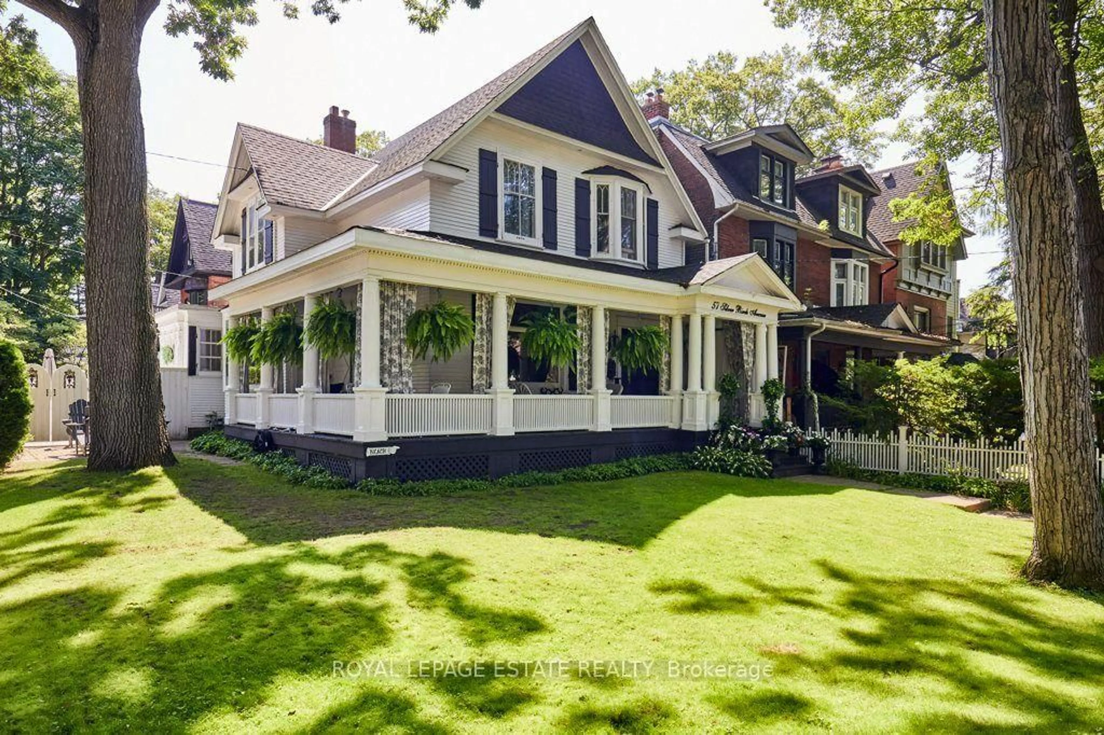 Home with vinyl exterior material, street for 57 Silver Birch Ave, Toronto Ontario M4E 3L1