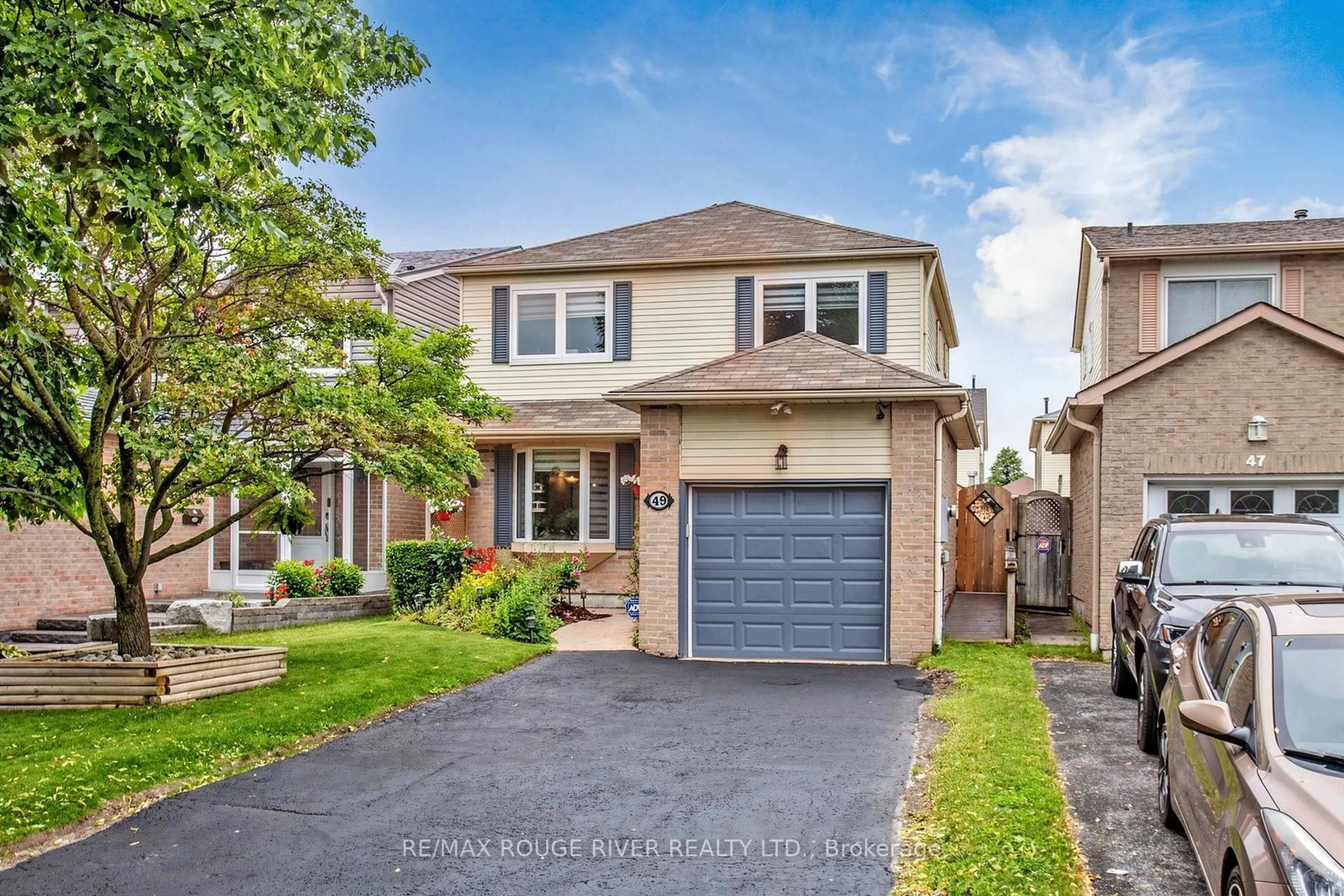 Home with brick exterior material, street for 49 Gilmour Dr, Ajax Ontario L1S 5J4