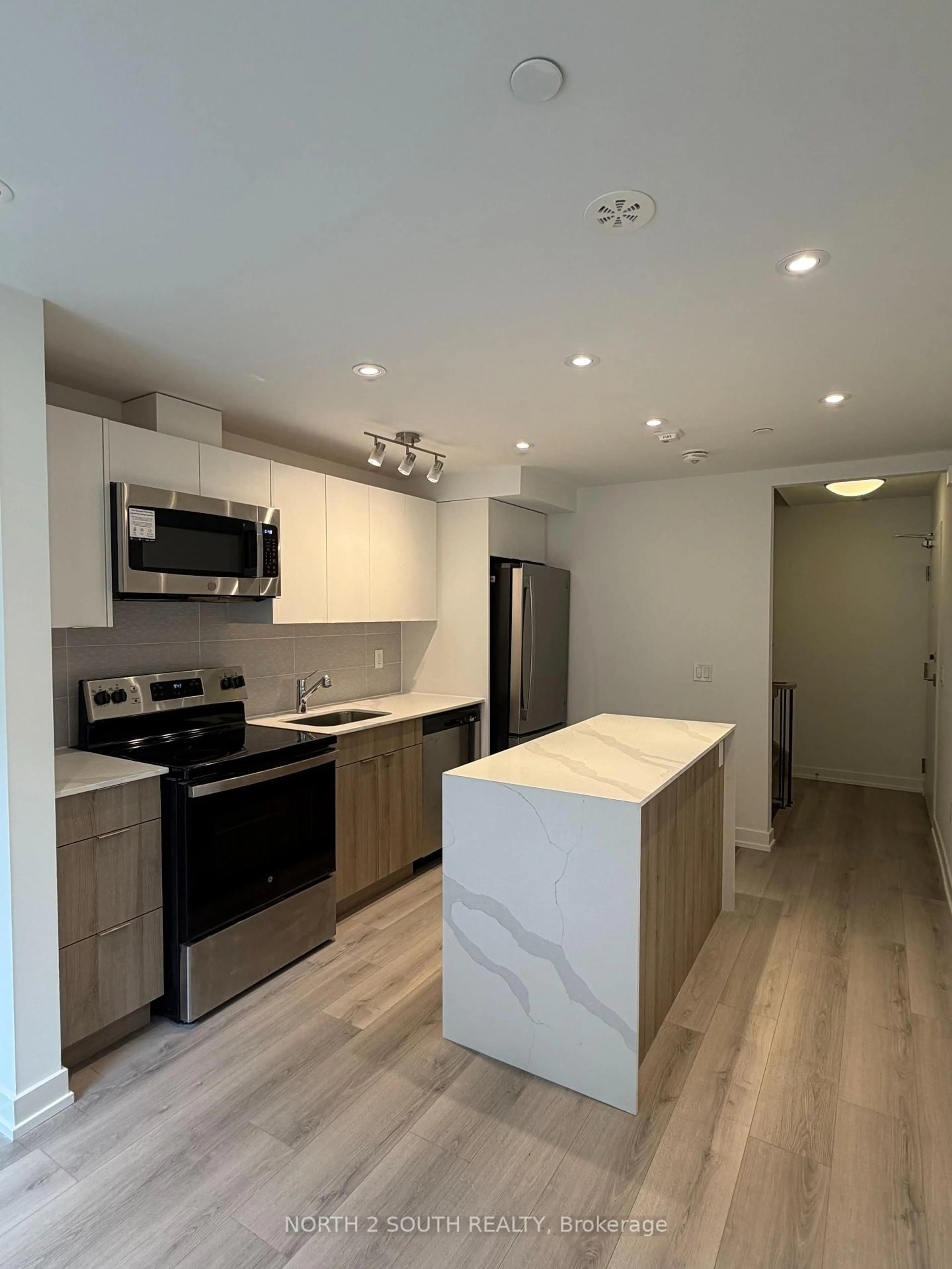 Open concept kitchen, unknown for 10 Calamint Lane #63, Toronto Ontario M1W 2H1