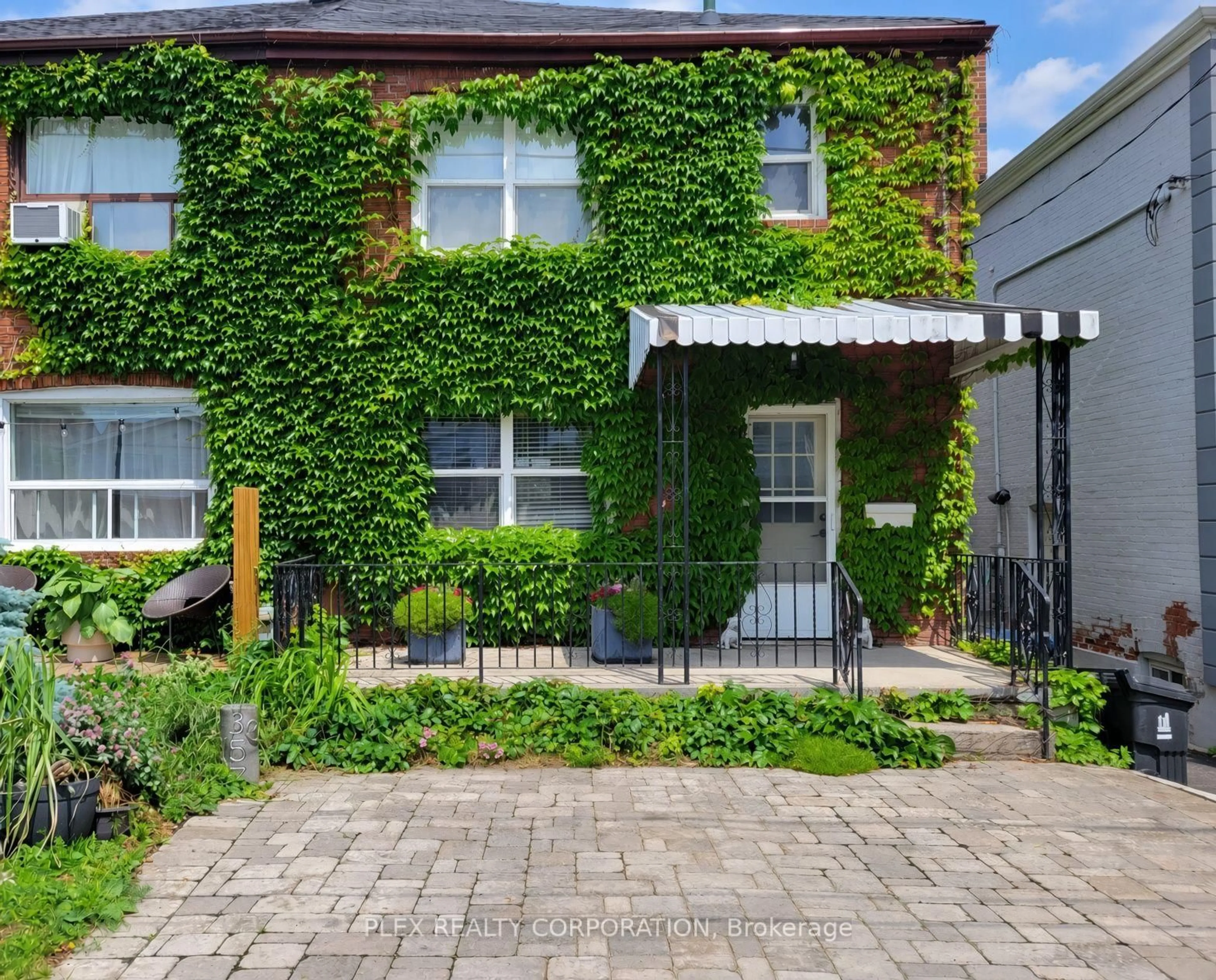 Home with brick exterior material, street for 357 Victoria Park Ave, Toronto Ontario M4E 3S9